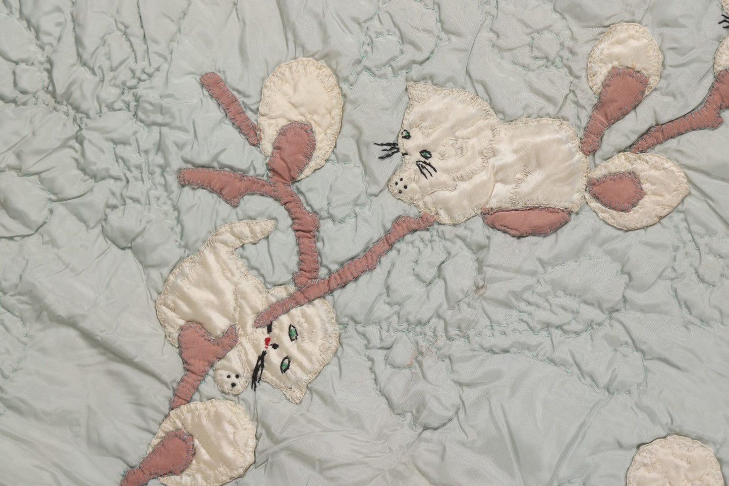 Lot 057 - Antique Hand Stitched Folk Art Quilt With White Kittens Climbing Cotton Plants, Robins Egg Blue Front And Yellow Reverse, Silk-Like Material, 39-1/2" x 42-1/2"