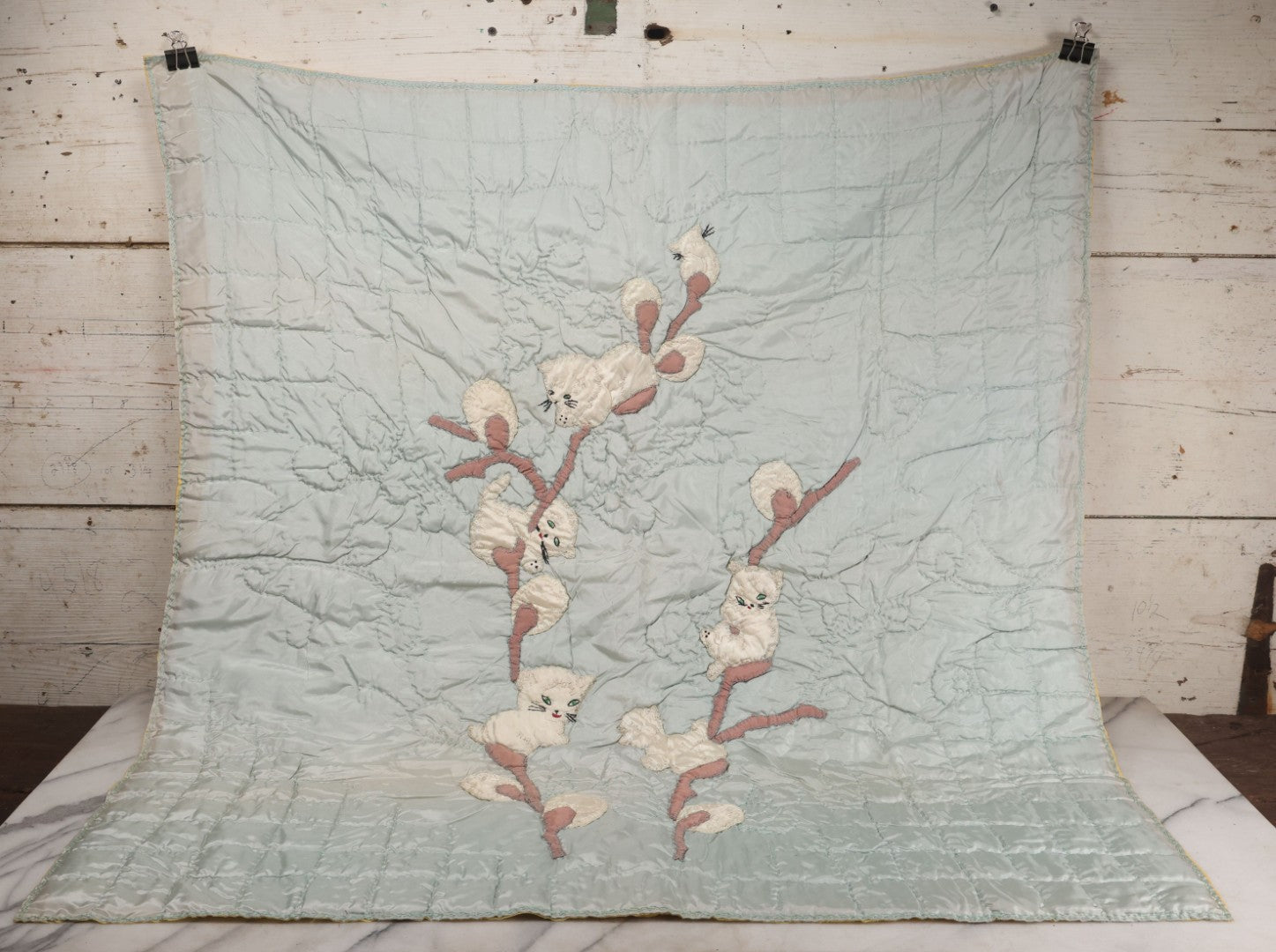 Lot 057 - Antique Hand Stitched Folk Art Quilt With White Kittens Climbing Cotton Plants, Robins Egg Blue Front And Yellow Reverse, Silk-Like Material, 39-1/2" x 42-1/2"