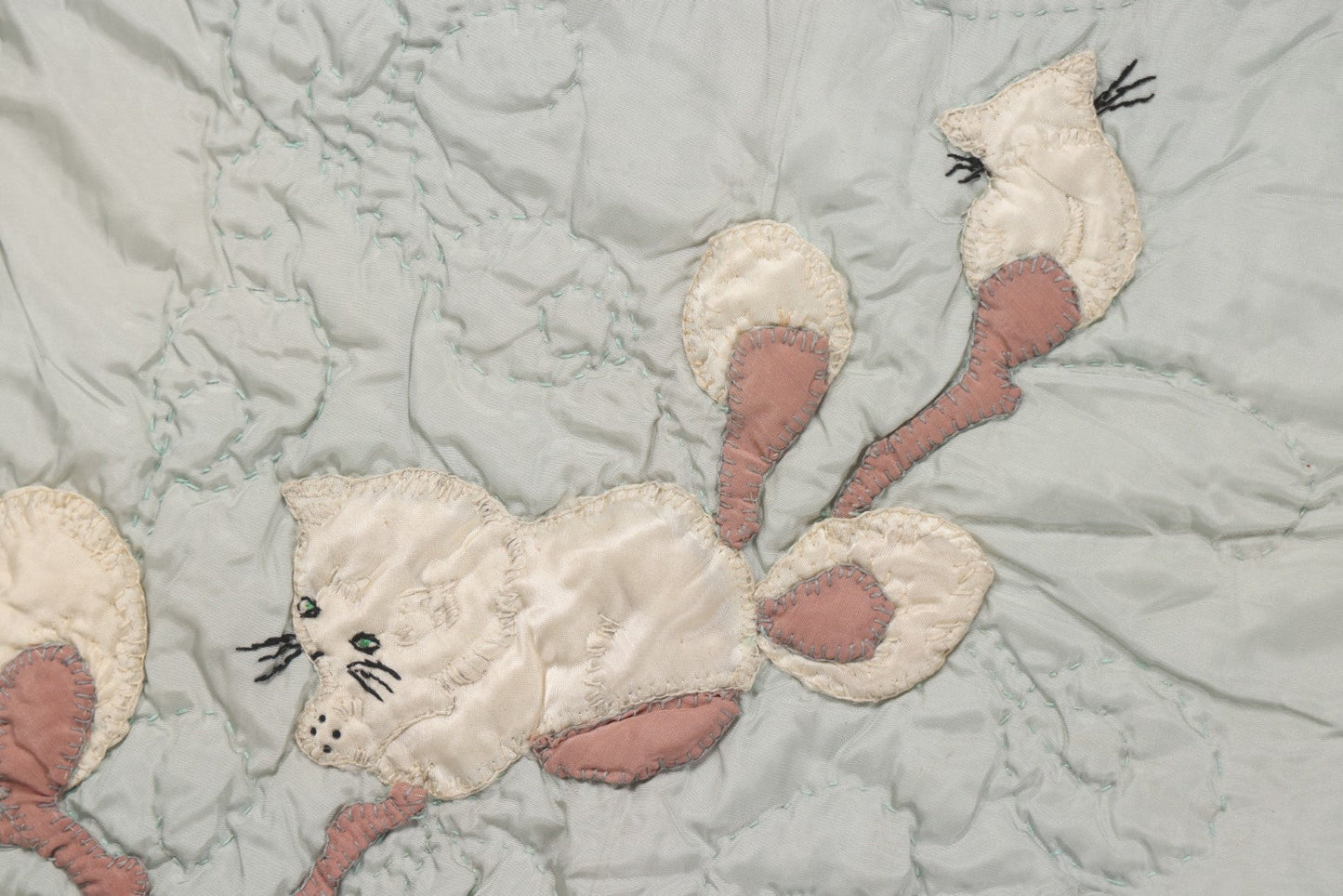 Lot 057 - Antique Hand Stitched Folk Art Quilt With White Kittens Climbing Cotton Plants, Robins Egg Blue Front And Yellow Reverse, Silk-Like Material, 39-1/2" x 42-1/2"