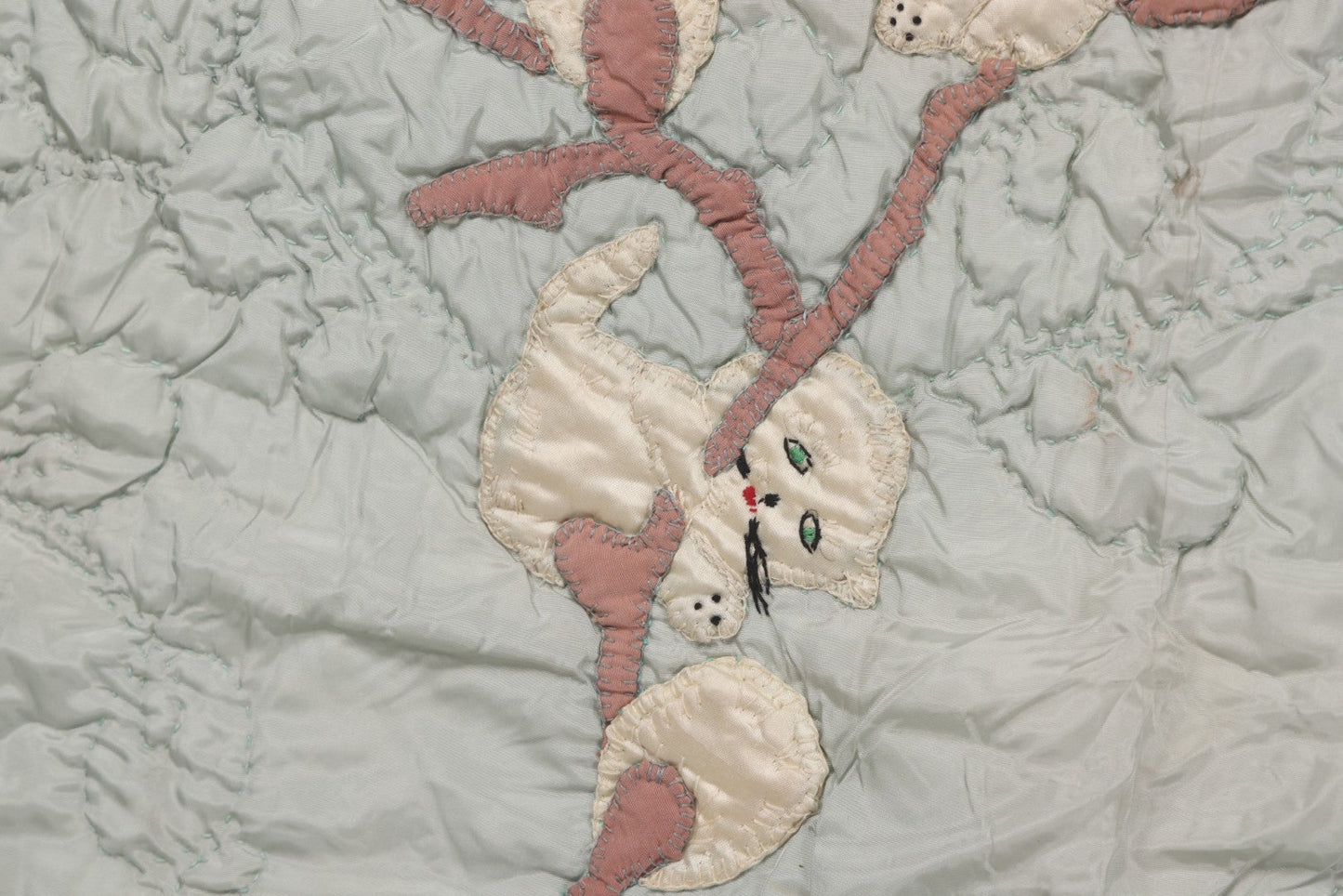 Lot 057 - Antique Hand Stitched Folk Art Quilt With White Kittens Climbing Cotton Plants, Robins Egg Blue Front And Yellow Reverse, Silk-Like Material, 39-1/2" x 42-1/2"