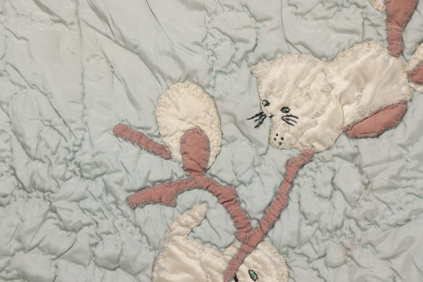 Lot 057 - Antique Hand Stitched Folk Art Quilt With White Kittens Climbing Cotton Plants, Robins Egg Blue Front And Yellow Reverse, Silk-Like Material, 39-1/2" x 42-1/2"