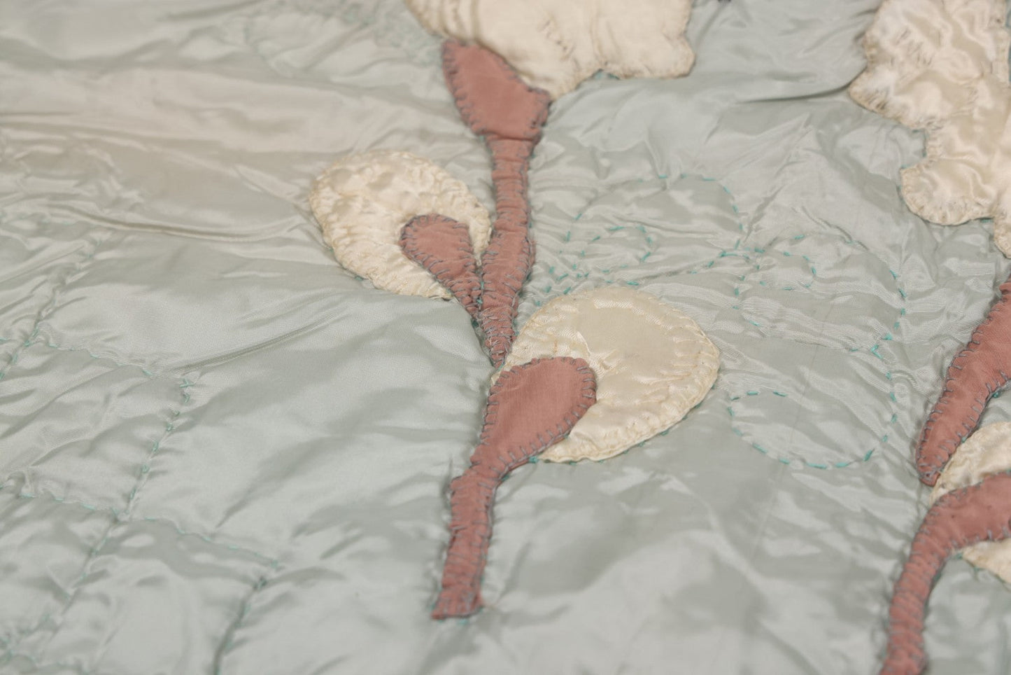 Lot 057 - Antique Hand Stitched Folk Art Quilt With White Kittens Climbing Cotton Plants, Robins Egg Blue Front And Yellow Reverse, Silk-Like Material, 39-1/2" x 42-1/2"