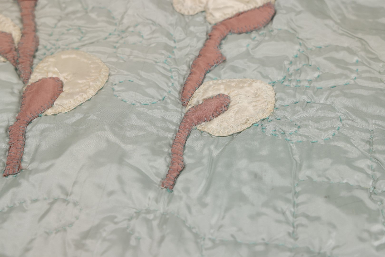 Lot 057 - Antique Hand Stitched Folk Art Quilt With White Kittens Climbing Cotton Plants, Robins Egg Blue Front And Yellow Reverse, Silk-Like Material, 39-1/2" x 42-1/2"