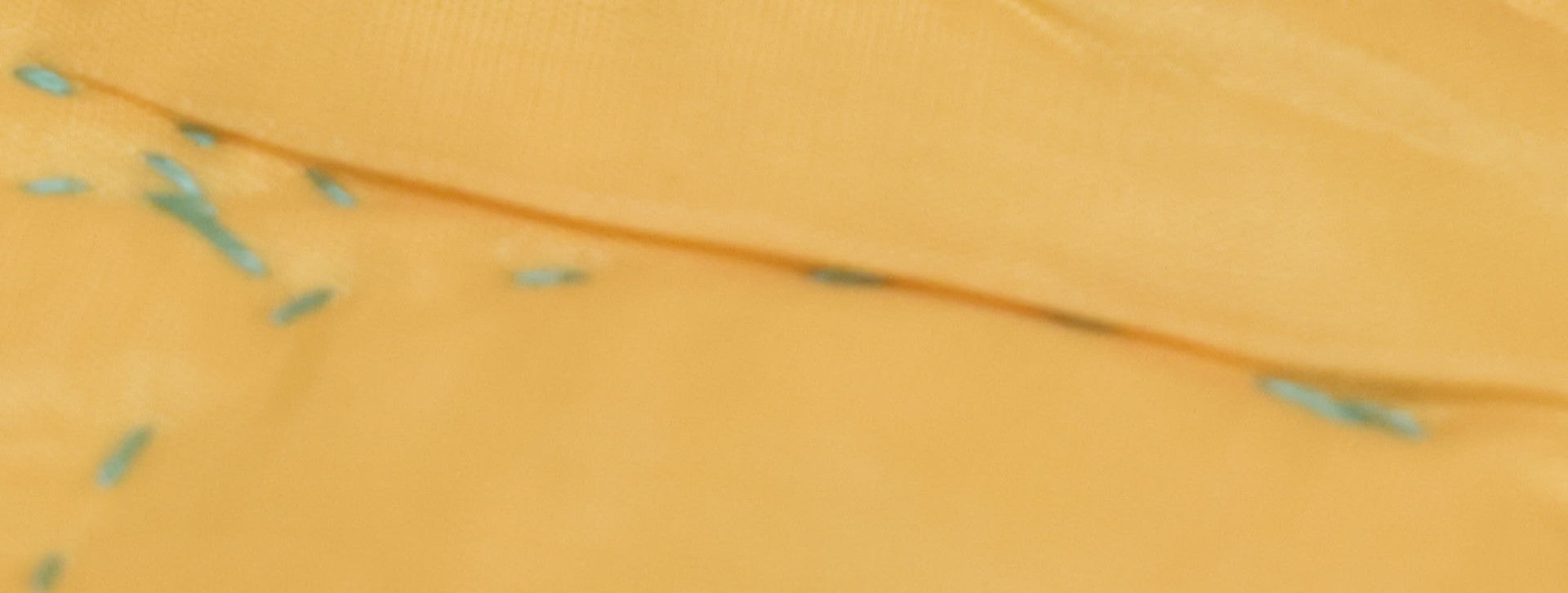 Lot 057 - Antique Hand Stitched Folk Art Quilt With White Kittens Climbing Cotton Plants, Robins Egg Blue Front And Yellow Reverse, Silk-Like Material, 39-1/2" x 42-1/2"