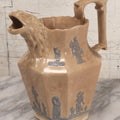 Lot 058 - Antique White Ironstone Pitcher With Figural Lion Head Spout, Blue Molded Neoclassical Figures, Note Damaged With Old Repairs, 9-3/4" Height