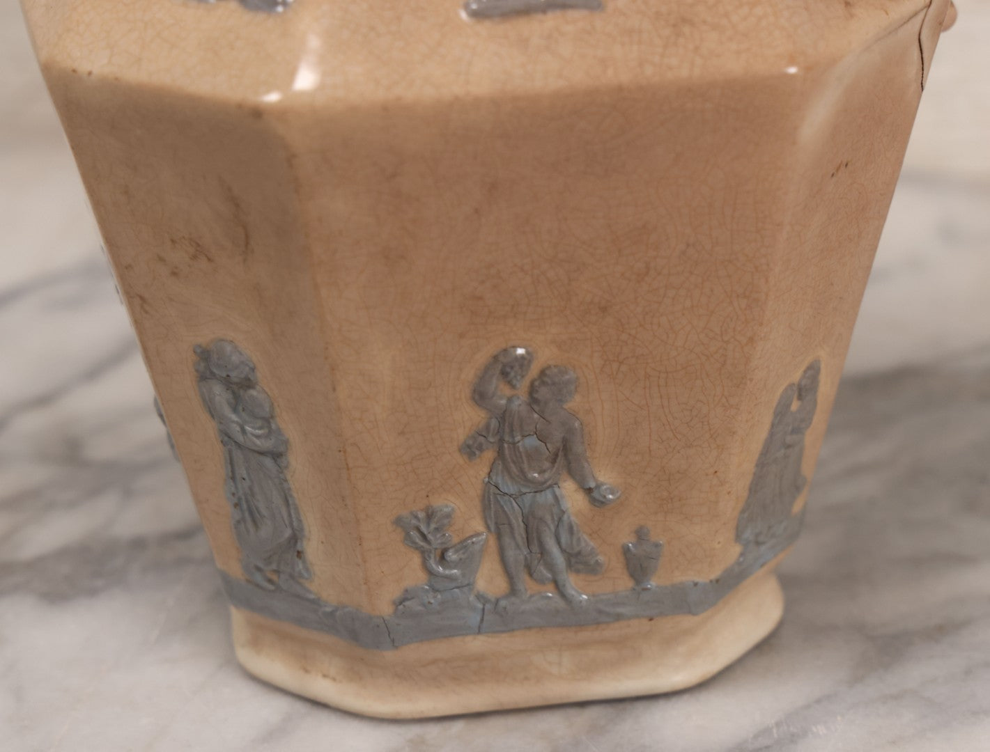 Lot 058 - Antique White Ironstone Pitcher With Figural Lion Head Spout, Blue Molded Neoclassical Figures, Note Damaged With Old Repairs, 9-3/4" Height
