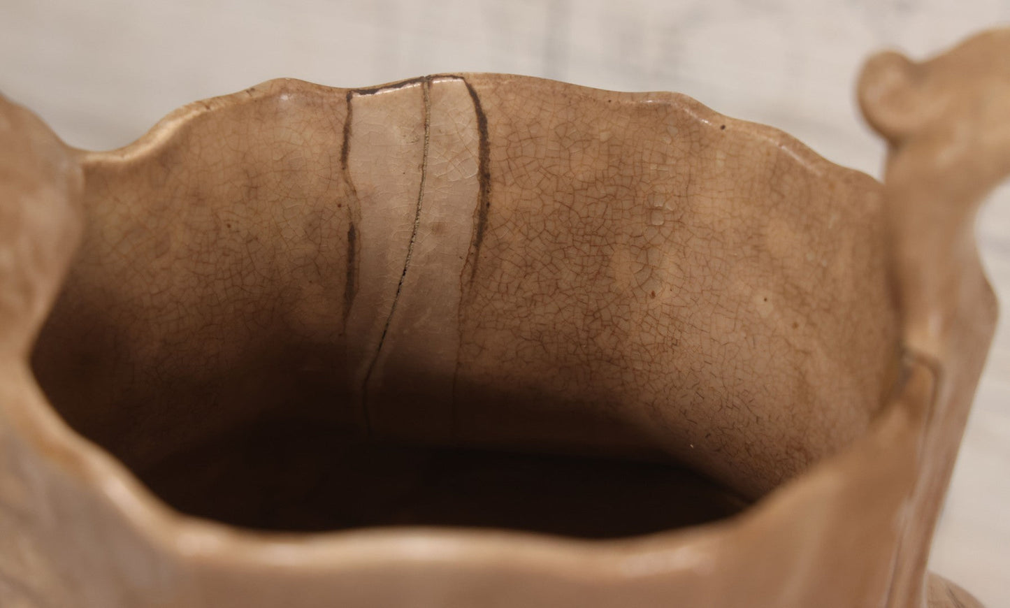 Lot 058 - Antique White Ironstone Pitcher With Figural Lion Head Spout, Blue Molded Neoclassical Figures, Note Damaged With Old Repairs, 9-3/4" Height