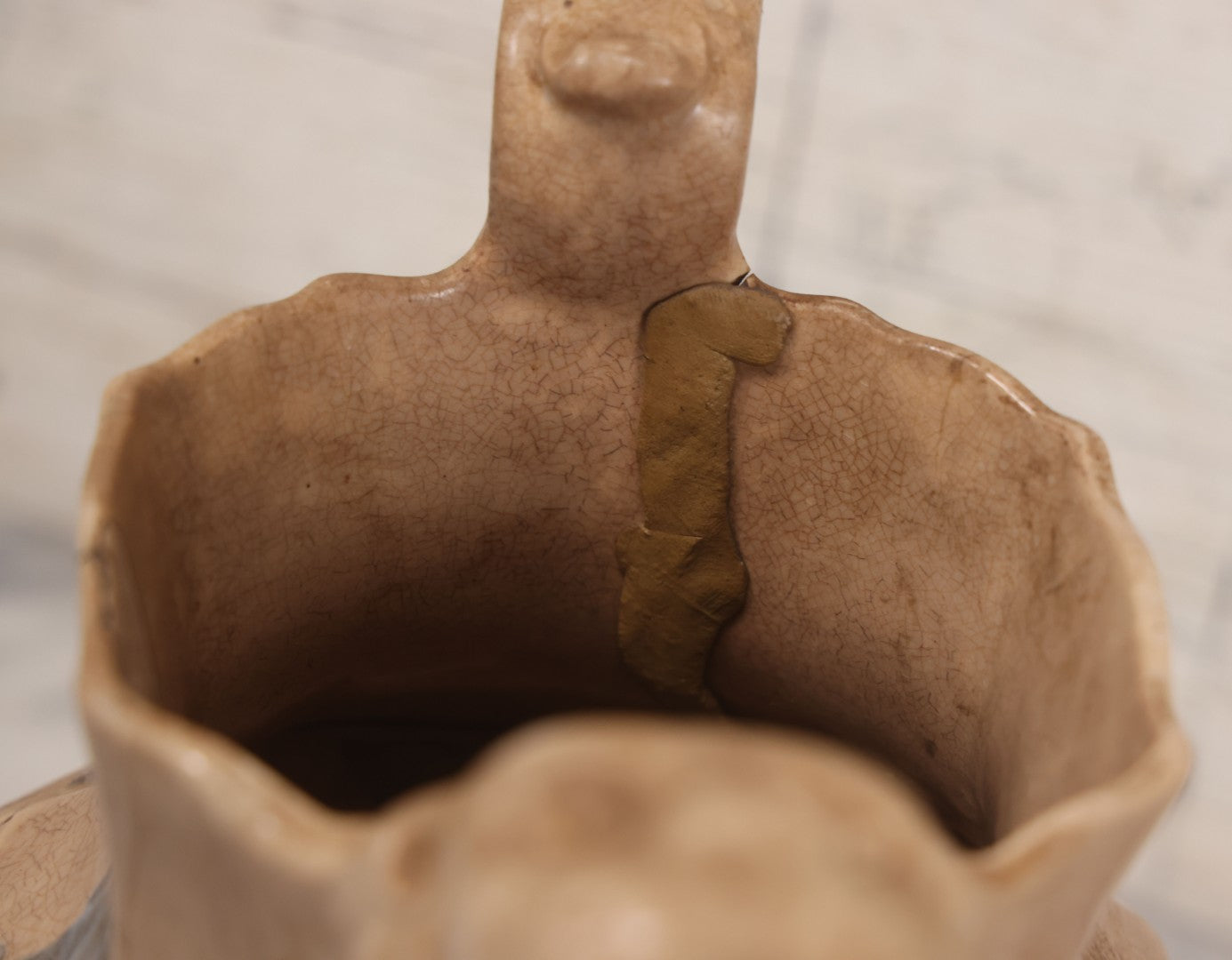 Lot 058 - Antique White Ironstone Pitcher With Figural Lion Head Spout, Blue Molded Neoclassical Figures, Note Damaged With Old Repairs, 9-3/4" Height