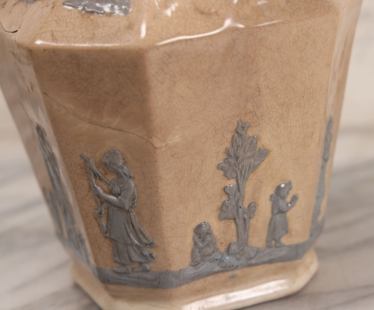 Lot 058 - Antique White Ironstone Pitcher With Figural Lion Head Spout, Blue Molded Neoclassical Figures, Note Damaged With Old Repairs, 9-3/4" Height