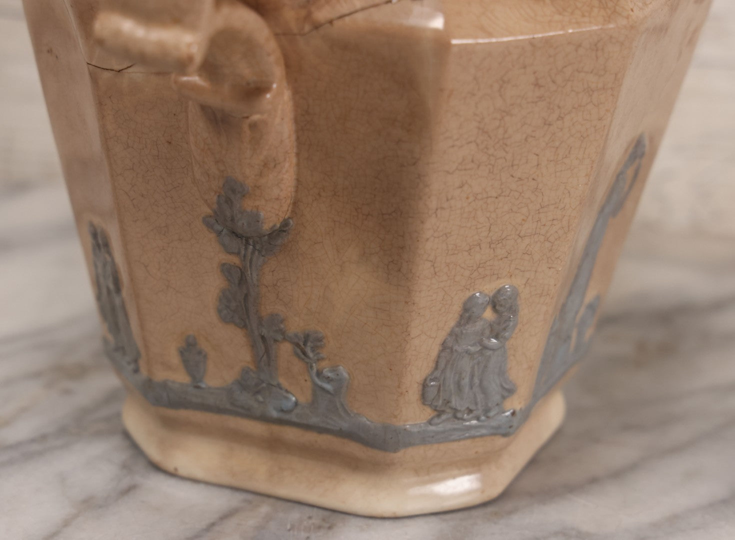 Lot 058 - Antique White Ironstone Pitcher With Figural Lion Head Spout, Blue Molded Neoclassical Figures, Note Damaged With Old Repairs, 9-3/4" Height