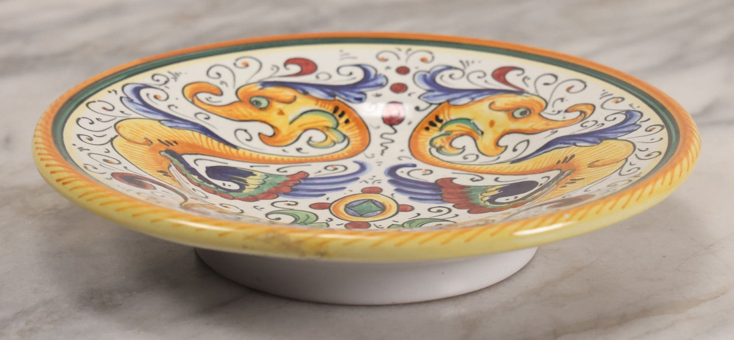 Lot 060 - Vintage Hand Painted Italian Deruta Majolica With Stylized Dolphins, Sea Monsters, Raffaellesco Design, Signed "S. Volpi, Deruta, II," 6-7/8" Diameter