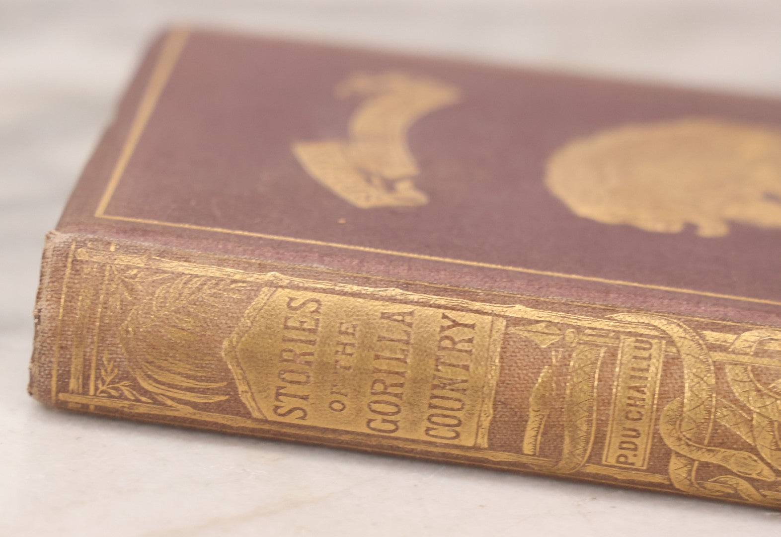 Lot 061 - "Stories Of The Gorilla Country, Narrated For Young People" Antique Book By Paul Du Chaillu, Illustrated, Gilded Gorilla Illustration On Cover, Harper & Brothers Publishers, New York, 1867