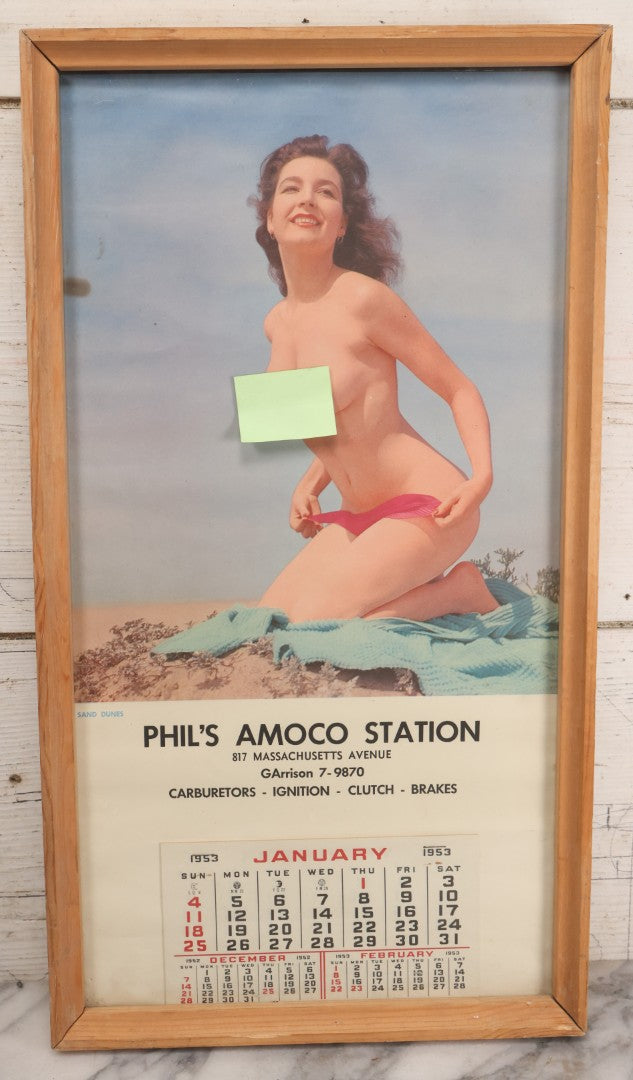 Lot 076 - Vintage Nude Woman Photo Pin-Up 1953 Calendar, "Sand Dunes," Advertisement For Phil's Amoco Station, Cambridge, Massachusetts, In Frame, 11-3/4" x 21-3/8"