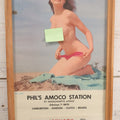 Lot 076 - Vintage Nude Woman Photo Pin-Up 1953 Calendar, "Sand Dunes," Advertisement For Phil's Amoco Station, Cambridge, Massachusetts, In Frame, 11-3/4" x 21-3/8"