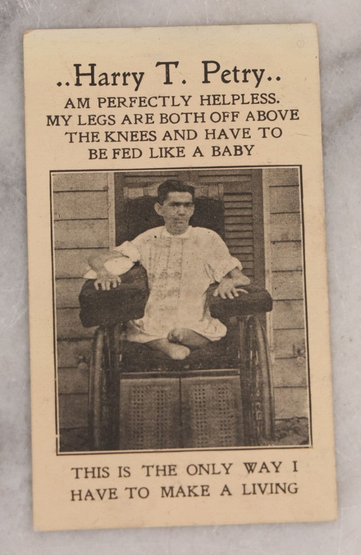 Lot 082 - Antique Charity Solicitation Card Sold By Harry T. Petry, States "Am Perfectly Helpless. My Legs Are Both Off Above The Knees And I Have To Feed Like A Baby, This Is The Only Way I Have To Make A Living," Good Luck Wish, Early 20th Century