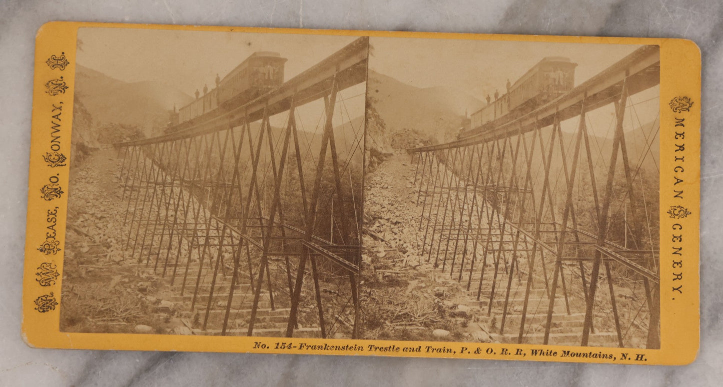Lot 084 - Grouping Of Four (And A Half) Antique Stereoview Stereocards With Photos Of Landmarks In The White Mountains, New Hampshire, Including The Old Man Of The Mountain, Tip Top House & Jacob's Ladder, Mt. Washington, And Frankenstein & Trestle Train