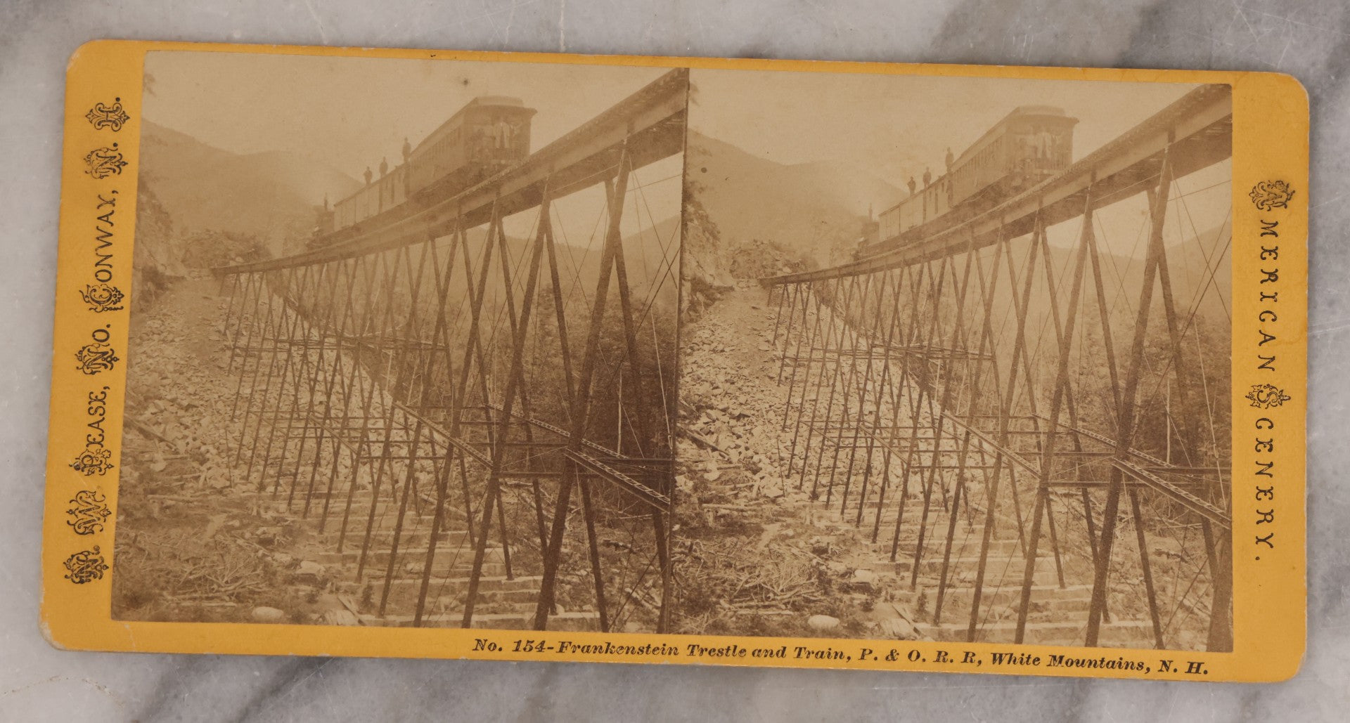 Lot 084 - Grouping Of Four (And A Half) Antique Stereoview Stereocards With Photos Of Landmarks In The White Mountains, New Hampshire, Including The Old Man Of The Mountain, Tip Top House & Jacob's Ladder, Mt. Washington, And Frankenstein & Trestle Train