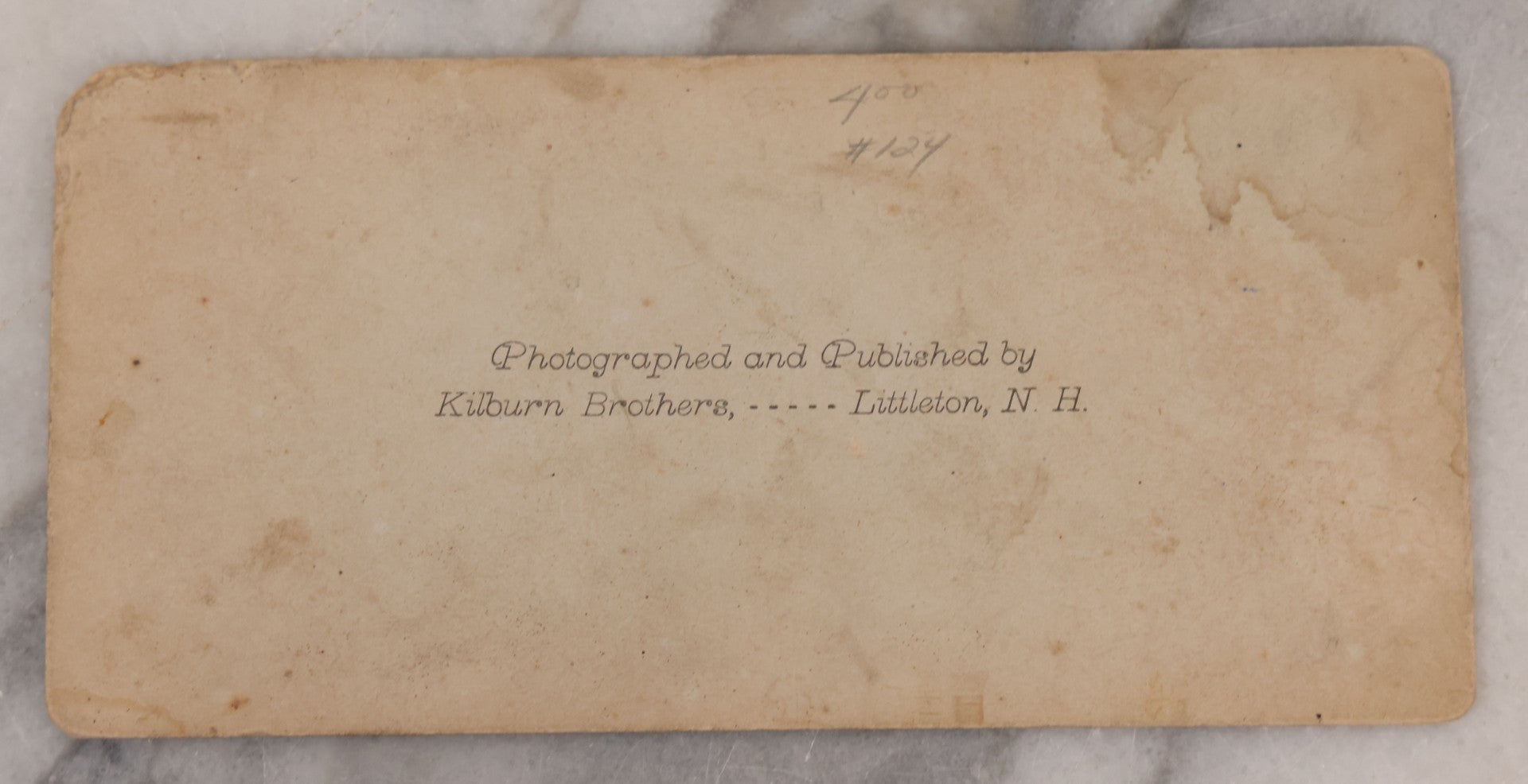 Lot 084 - Grouping Of Four (And A Half) Antique Stereoview Stereocards With Photos Of Landmarks In The White Mountains, New Hampshire, Including The Old Man Of The Mountain, Tip Top House & Jacob's Ladder, Mt. Washington, And Frankenstein & Trestle Train