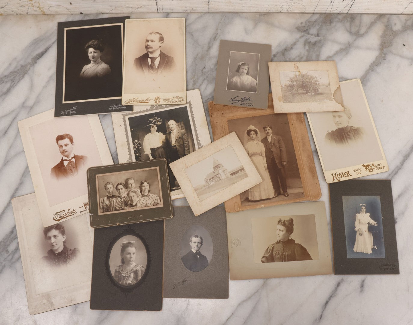 Lot 089 - Grouping Of 15 Antique Photographs Including Many Cabinet Card Portraits, Wedding Photo, Group Of Girls, Building, Tree, And More