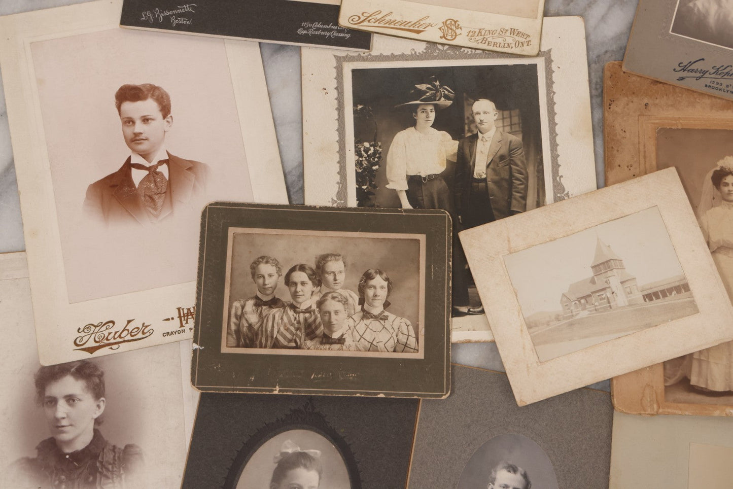 Lot 089 - Grouping Of 15 Antique Photographs Including Many Cabinet Card Portraits, Wedding Photo, Group Of Girls, Building, Tree, And More