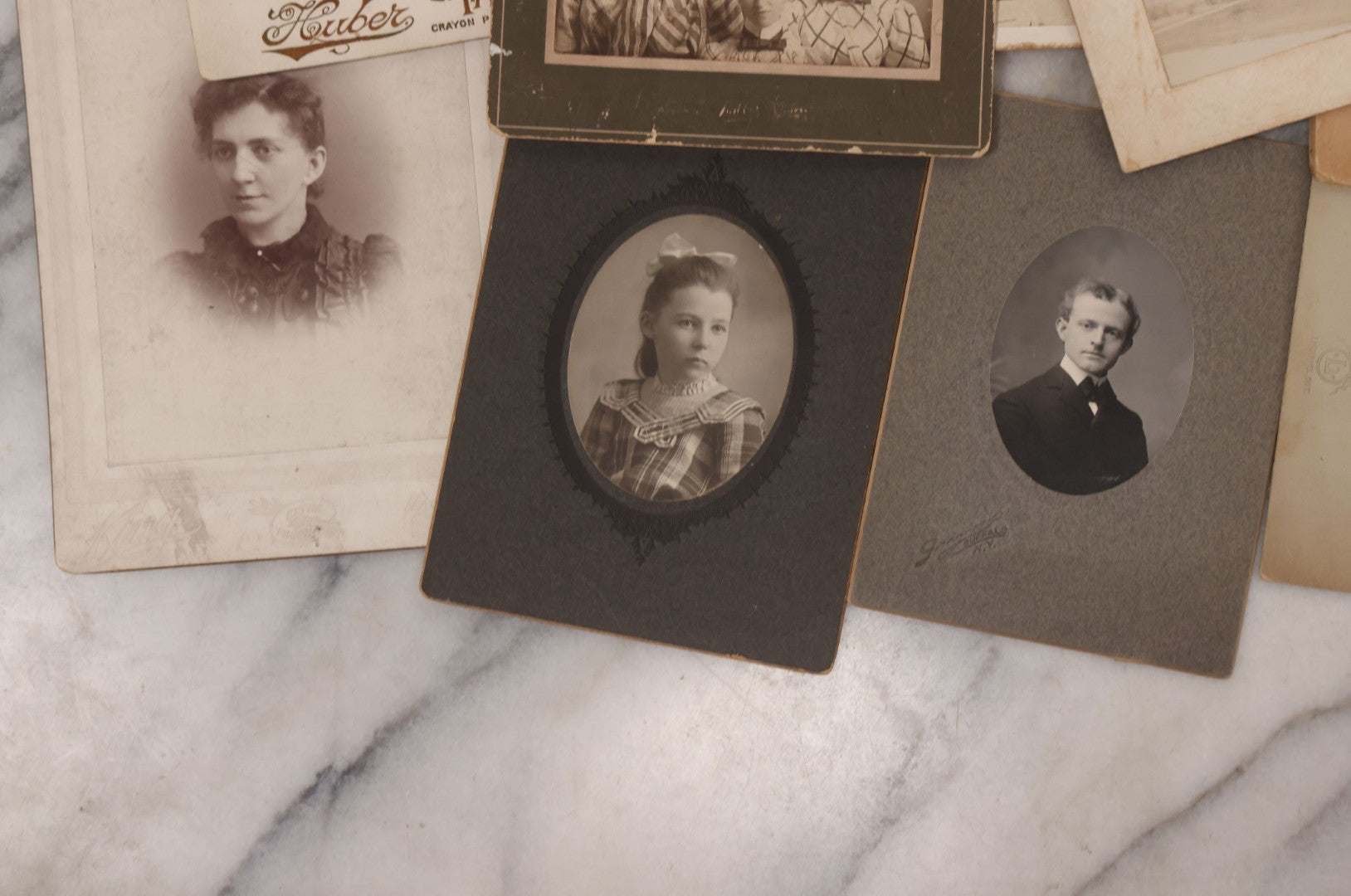 Lot 089 - Grouping Of 15 Antique Photographs Including Many Cabinet Card Portraits, Wedding Photo, Group Of Girls, Building, Tree, And More