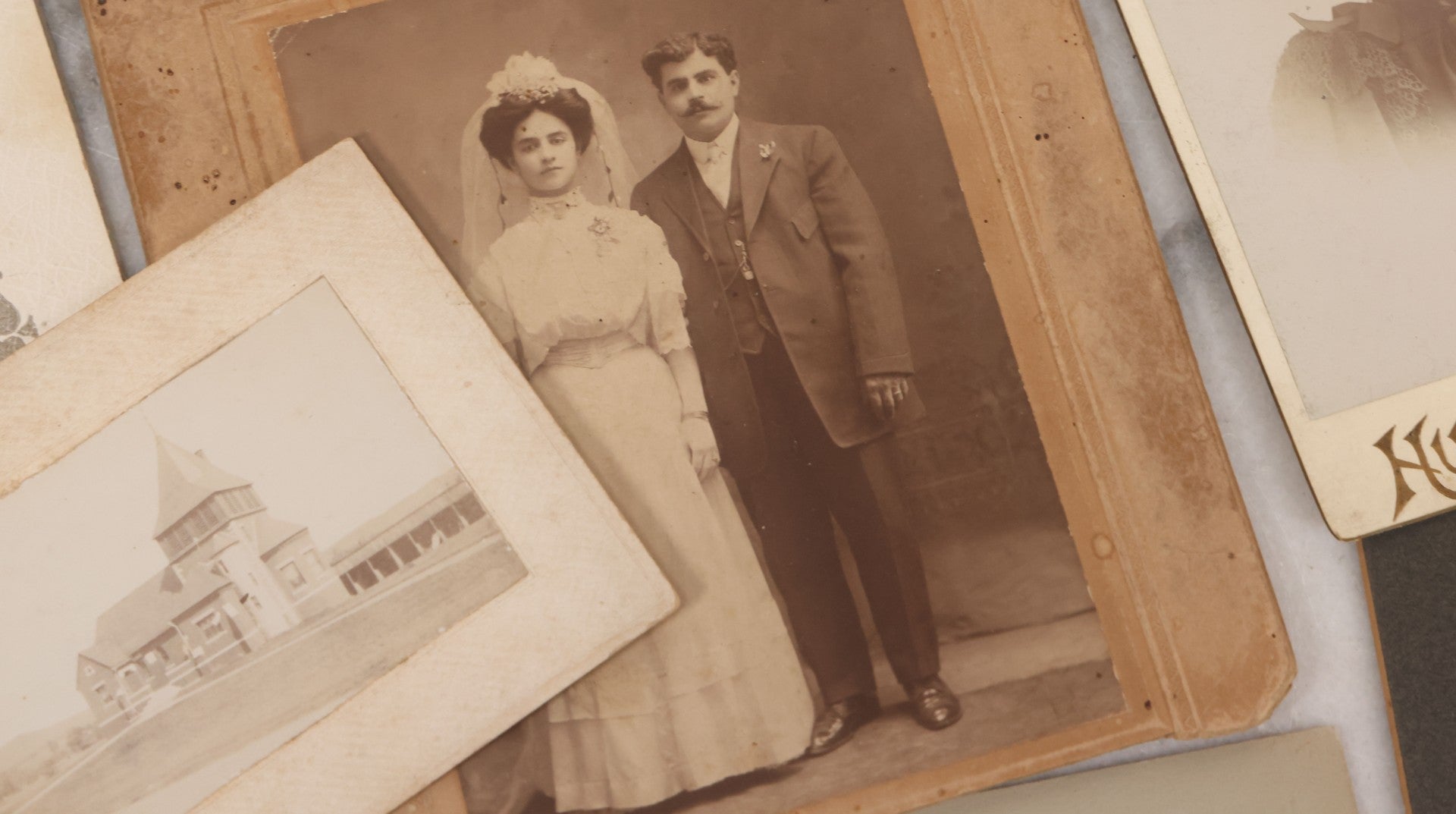 Lot 089 - Grouping Of 15 Antique Photographs Including Many Cabinet Card Portraits, Wedding Photo, Group Of Girls, Building, Tree, And More