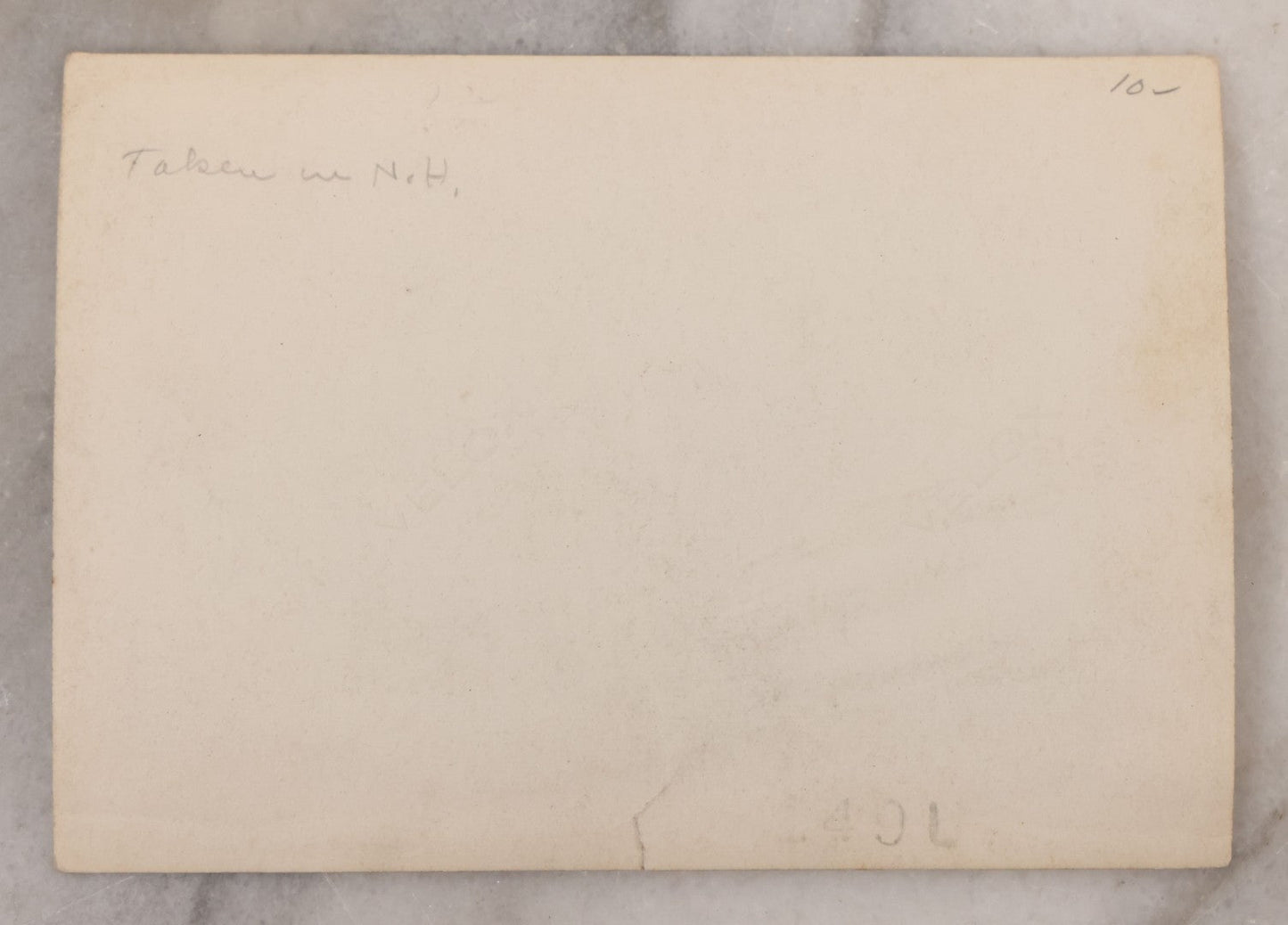 Lot 100 - Single Antique Snapshot Photograph Of A Man Crossing A River On A Makeshift Rope And Pulley Trolley, Taken In New Hampshire