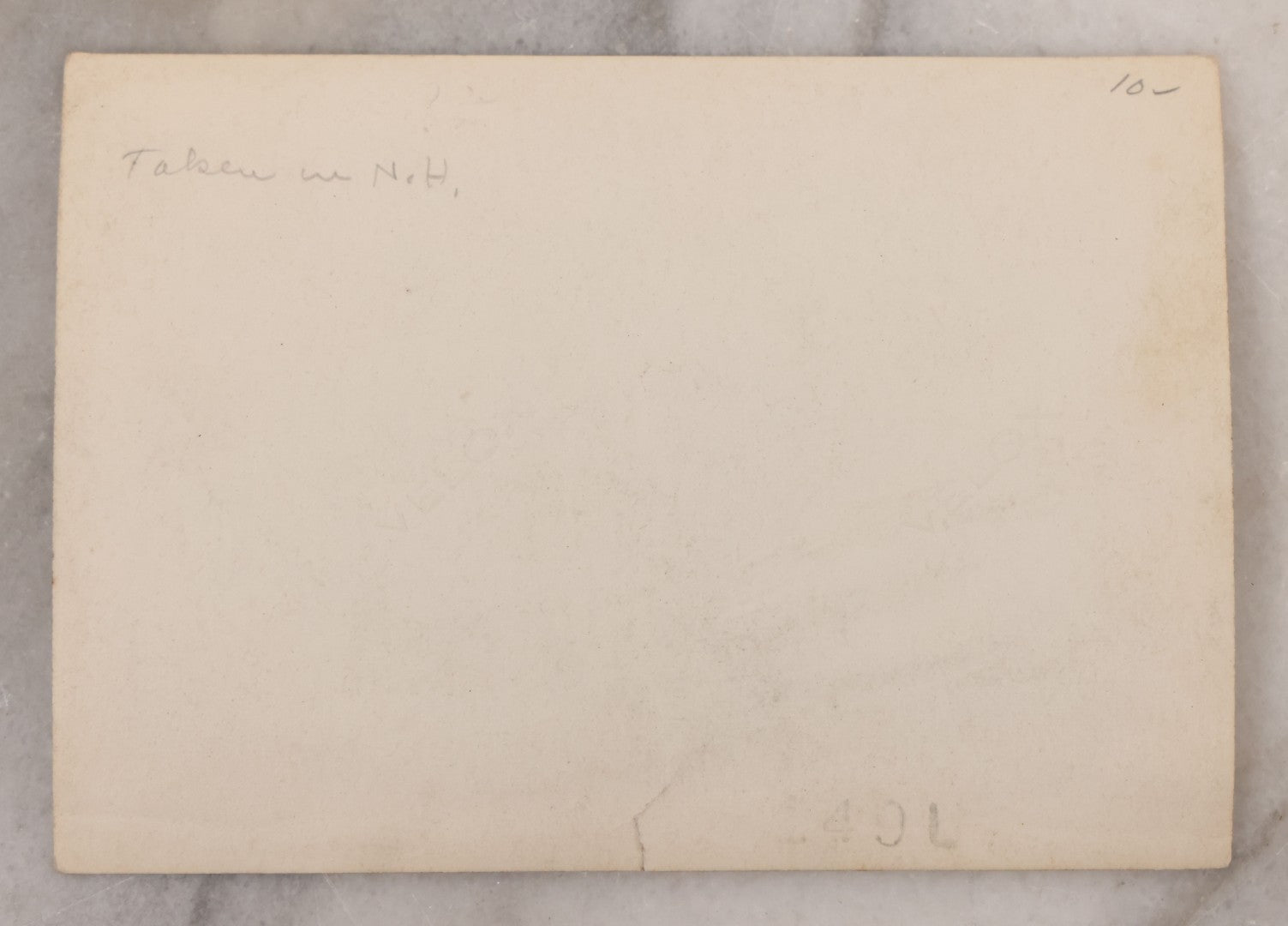 Lot 100 - Single Antique Snapshot Photograph Of A Man Crossing A River On A Makeshift Rope And Pulley Trolley, Taken In New Hampshire