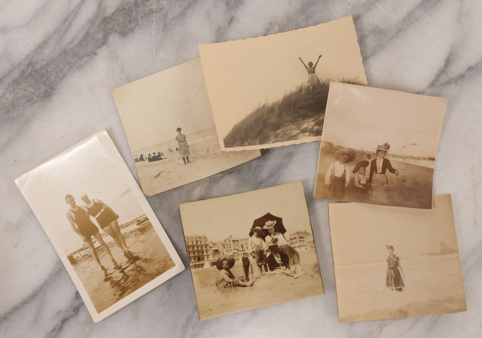 Lot 103 - Grouping Of Five Antique And Vintage Snapshot Photographs Of Men, Women, And Children At The Beach