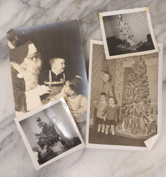 Lot 107 - Grouping Of Four Vintage Christmas Photographs Including Kids Scared Of Santa, And Photos By Christmas Tree