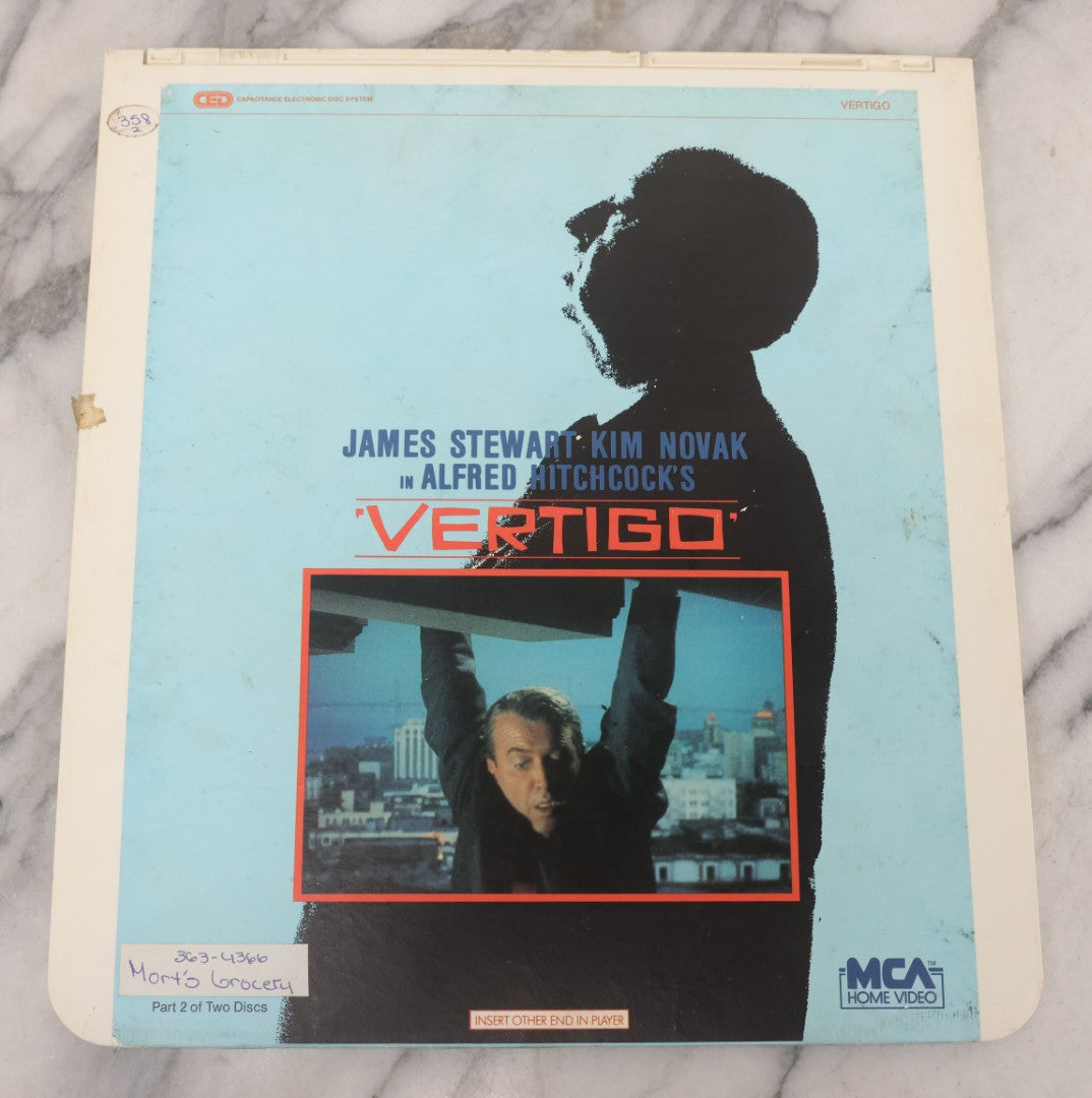 Lot 112 - "Vertigo" (1958) Vintage Thriller Movie Directed By Alfred Hitchcock, Starring Jimmy Stewart, M.C.A. Home Video Disc, Capacitance Electronic Disc (CED), Copyright 1984 M.C.A. Home Video Inc., One Of Two Discs