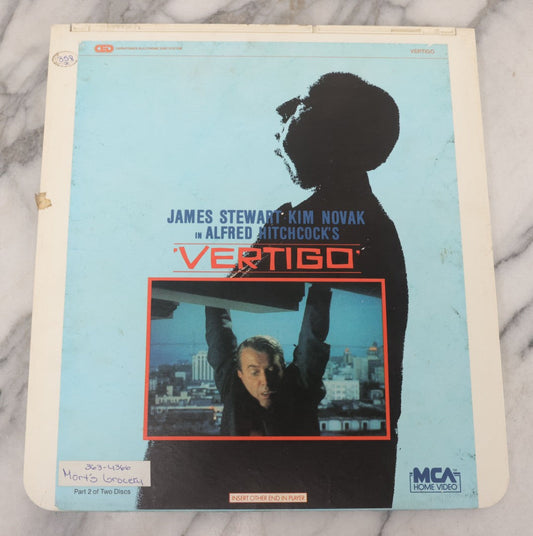 Lot 112 - "Vertigo" (1958) Vintage Thriller Movie Directed By Alfred Hitchcock, Starring Jimmy Stewart, M.C.A. Home Video Disc, Capacitance Electronic Disc (CED), Copyright 1984 M.C.A. Home Video Inc., One Of Two Discs
