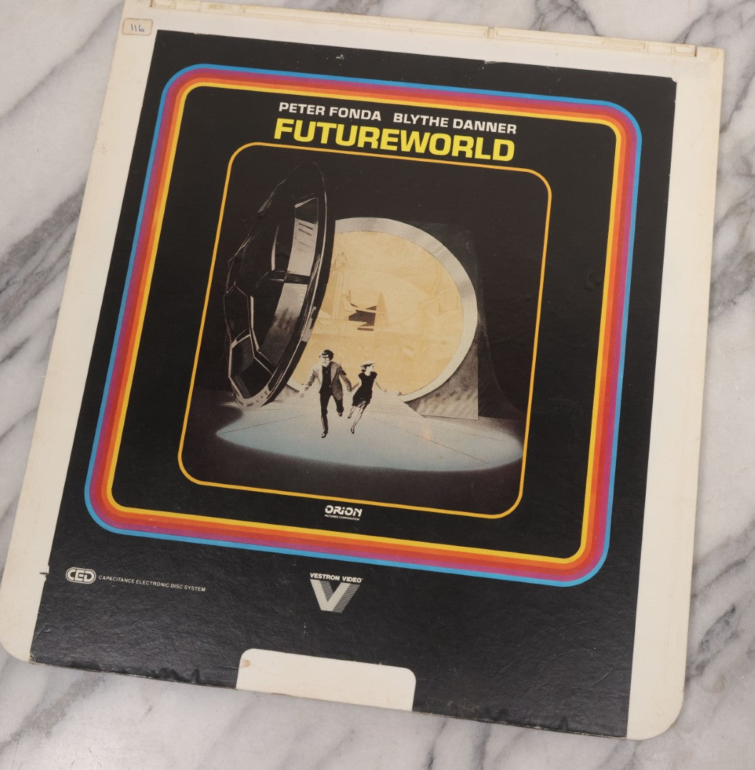 Lot 118 - Grouping Of Three Vintage Sci-Fi Movie Video Discs, Capacitance Electronic Disc (CED), Including "Futureworld" (1976), "The Last Chase" (1981), And "Metalstorm: The Destruction Of Jared-Syn" (1983)