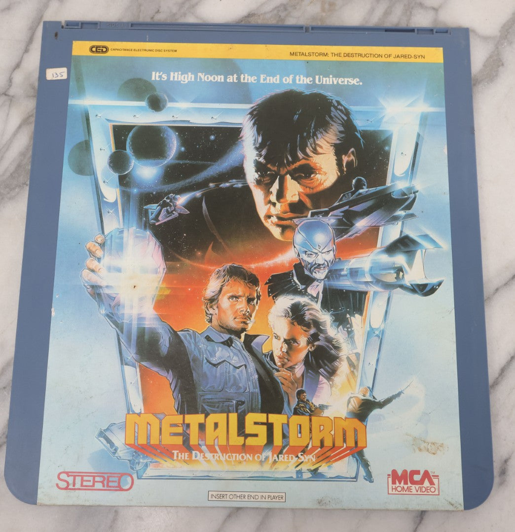 Lot 118 - Grouping Of Three Vintage Sci-Fi Movie Video Discs, Capacitance Electronic Disc (CED), Including "Futureworld" (1976), "The Last Chase" (1981), And "Metalstorm: The Destruction Of Jared-Syn" (1983)