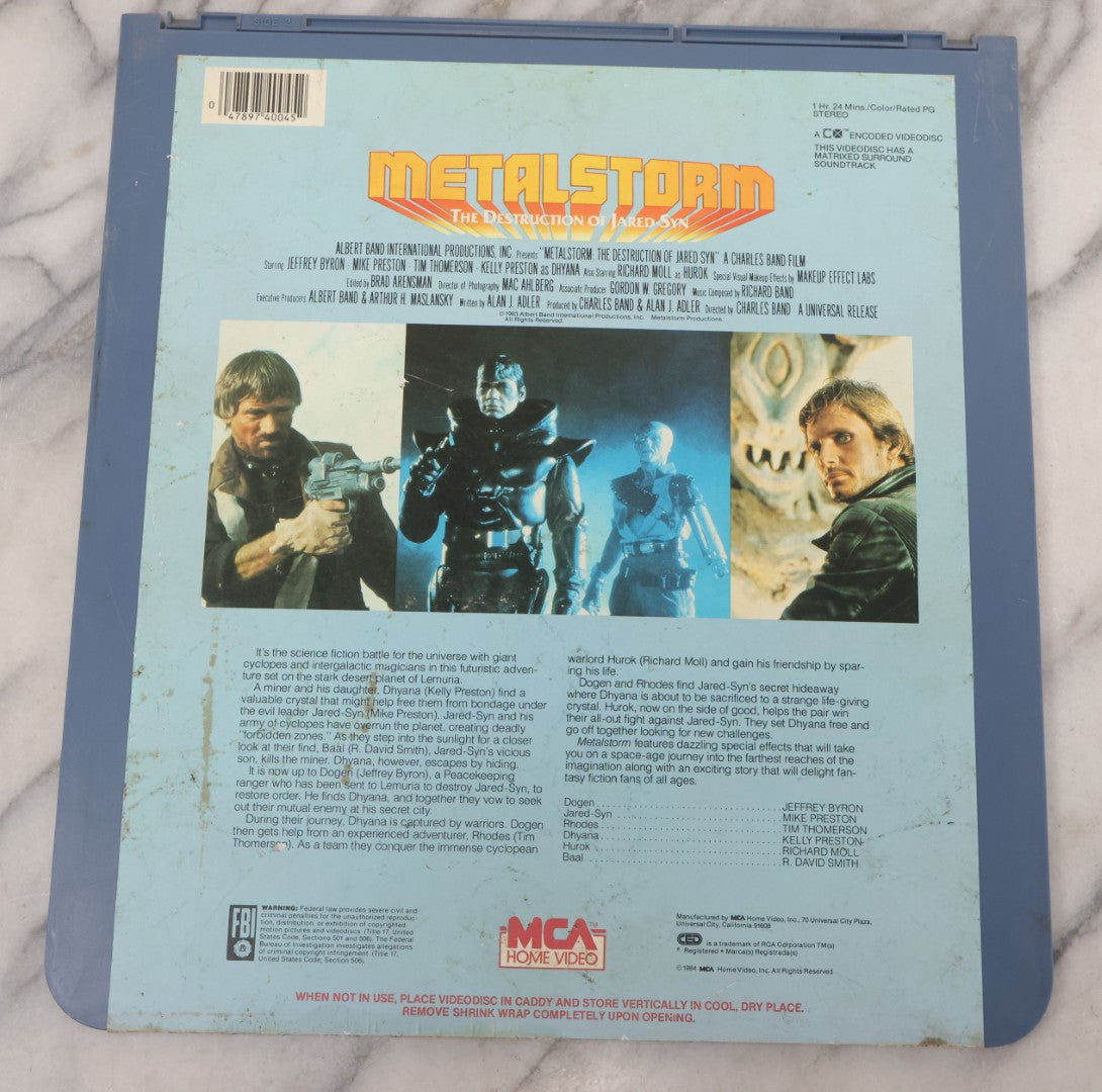 Lot 118 - Grouping Of Three Vintage Sci-Fi Movie Video Discs, Capacitance Electronic Disc (CED), Including "Futureworld" (1976), "The Last Chase" (1981), And "Metalstorm: The Destruction Of Jared-Syn" (1983)