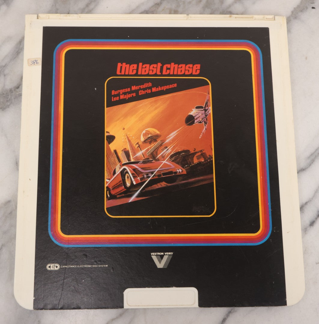 Lot 118 - Grouping Of Three Vintage Sci-Fi Movie Video Discs, Capacitance Electronic Disc (CED), Including "Futureworld" (1976), "The Last Chase" (1981), And "Metalstorm: The Destruction Of Jared-Syn" (1983)