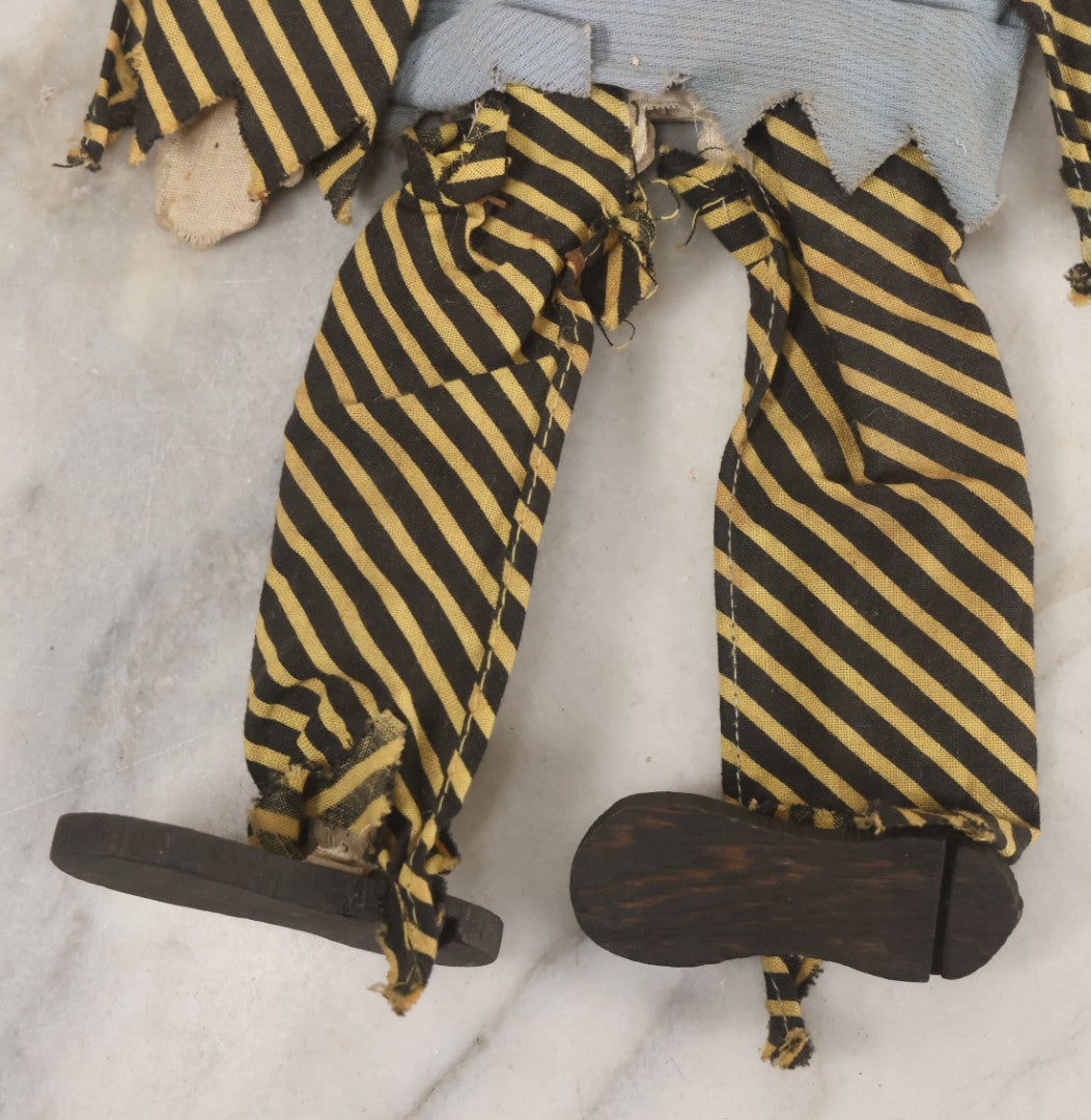 Lot 014 - Vintage Folk Art Hand Made Doll Puppet, Clown With Yellow And Black Striped Clothes Wooden Head And Feet, Cardstock Body, 14" Length