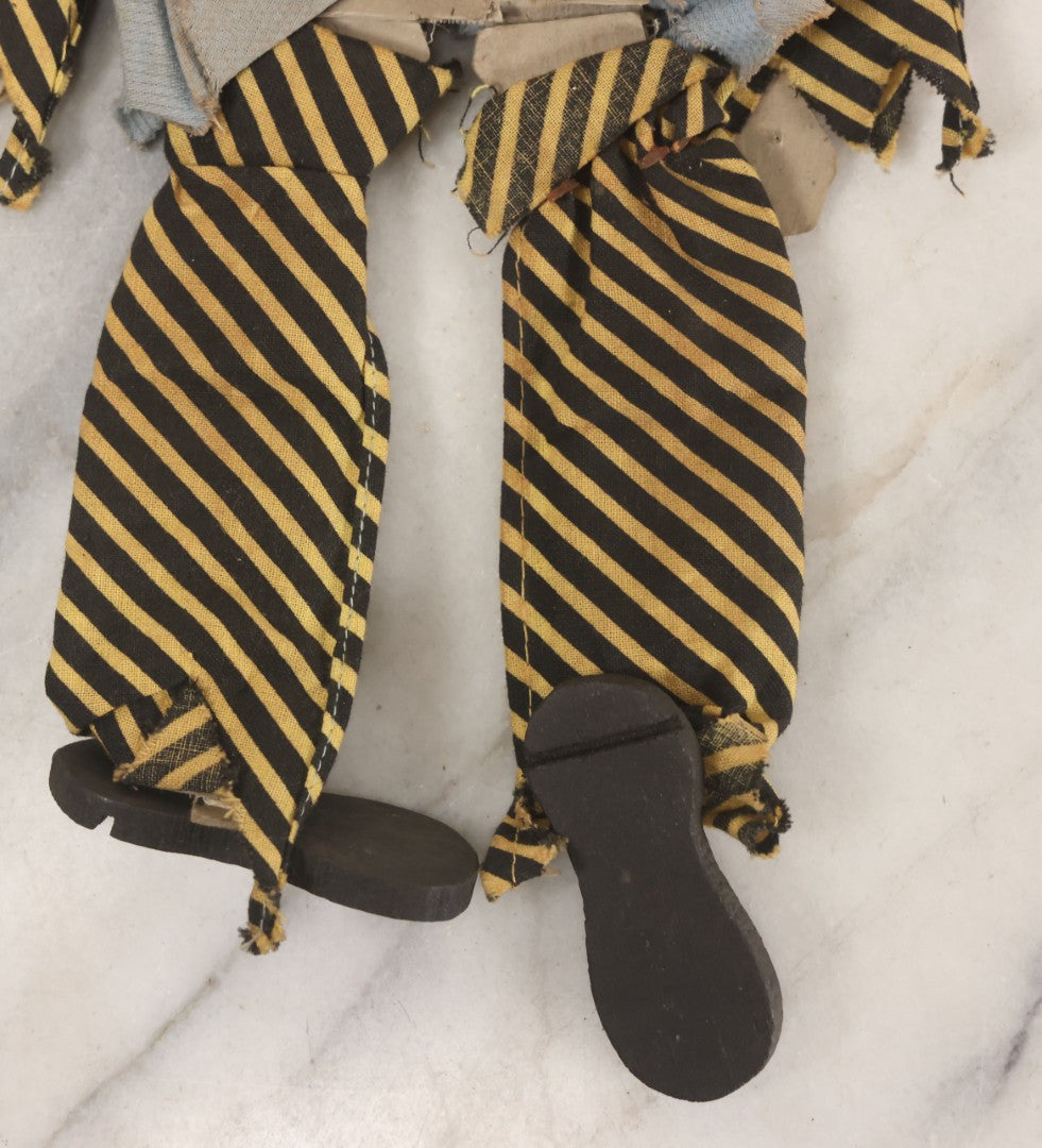 Lot 014 - Vintage Folk Art Hand Made Doll Puppet, Clown With Yellow And Black Striped Clothes Wooden Head And Feet, Cardstock Body, 14" Length