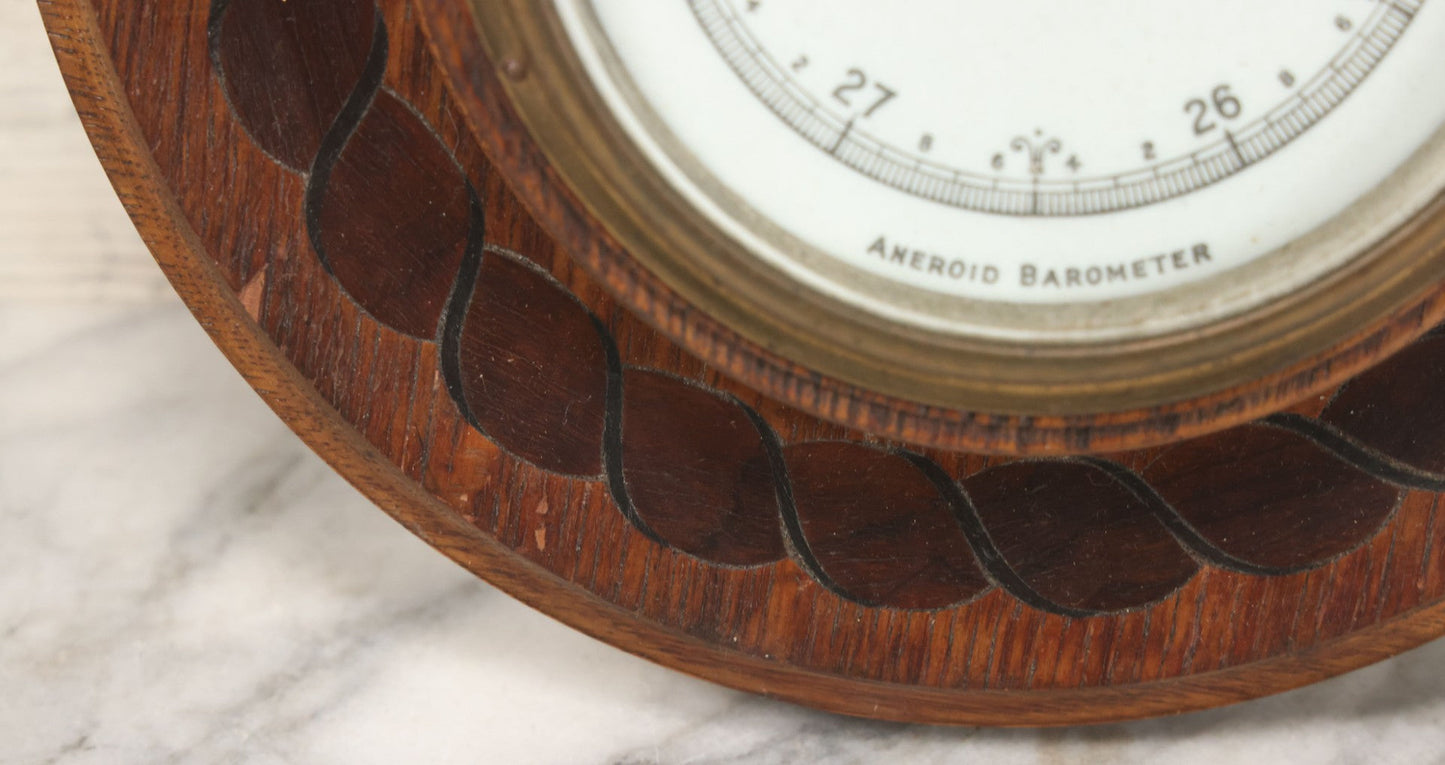 Lot 022 - Vintage Aneroid Barometer On Wood Plaque With Twisted Rope Inlay Motif, Beveled Glass Brass Surround, Wall Hanger, 9-3/4" Diameter