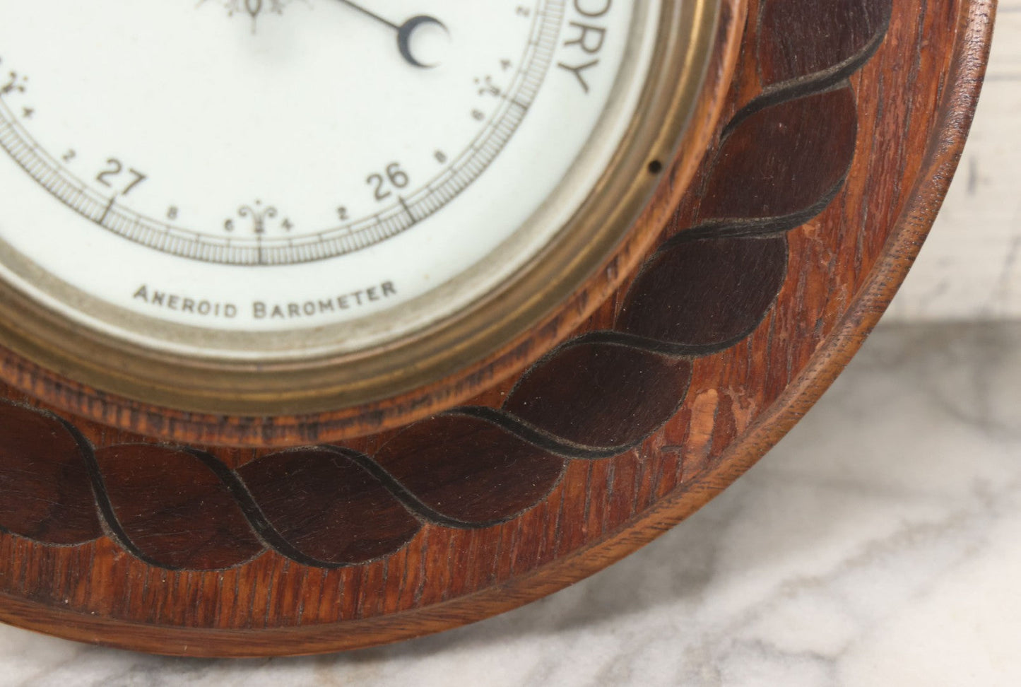 Lot 022 - Vintage Aneroid Barometer On Wood Plaque With Twisted Rope Inlay Motif, Beveled Glass Brass Surround, Wall Hanger, 9-3/4" Diameter