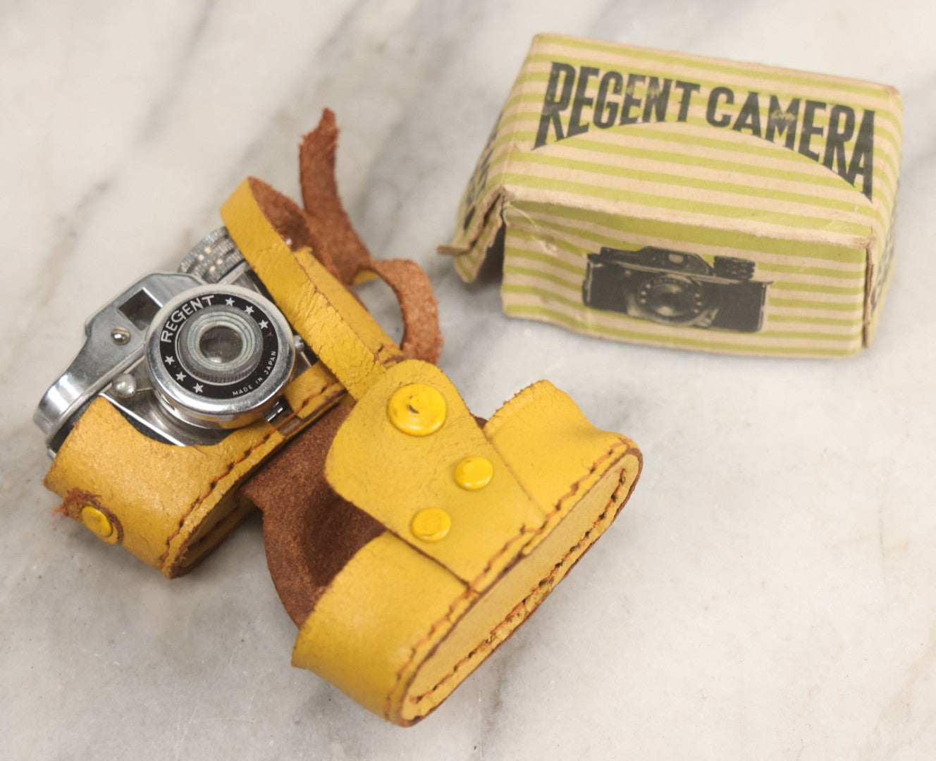 Lot 029 - Vintage Regent Satellite Miniature Novelty Spy Camera With Original Yellow Body Cover, Advertising Box, With Paperwork, Made In Japan