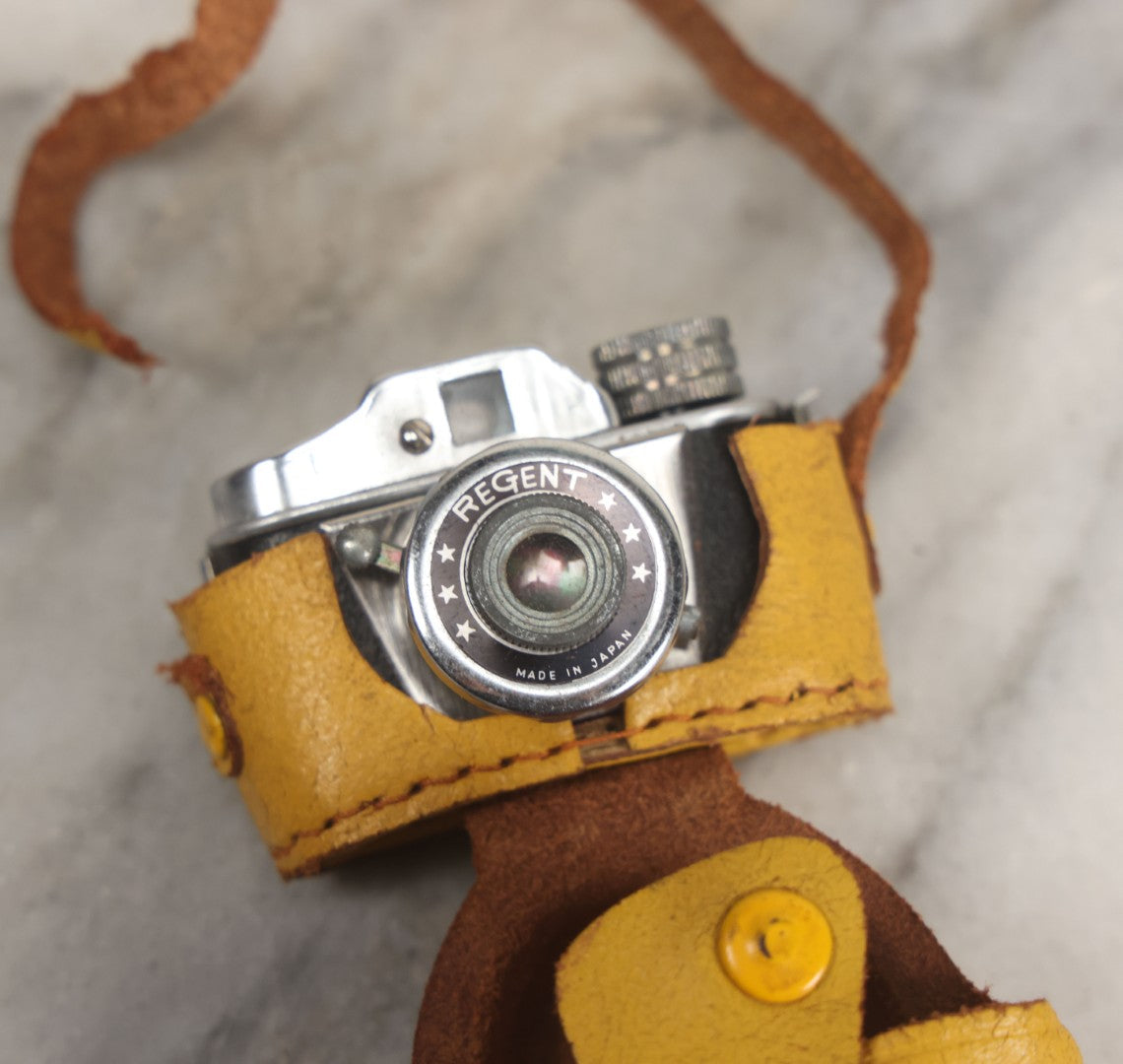 Lot 029 - Vintage Regent Satellite Miniature Novelty Spy Camera With Original Yellow Body Cover, Advertising Box, With Paperwork, Made In Japan