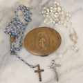Lot 031 - Vintage Brass Rosary Case With Miraculous Medal / Medal Of The Immaculate Conception Motif, Commemorating The Apparition Our Lady To Saint Catherine Labouré, 1830, Containing Two Rosaries With Glass Beads
