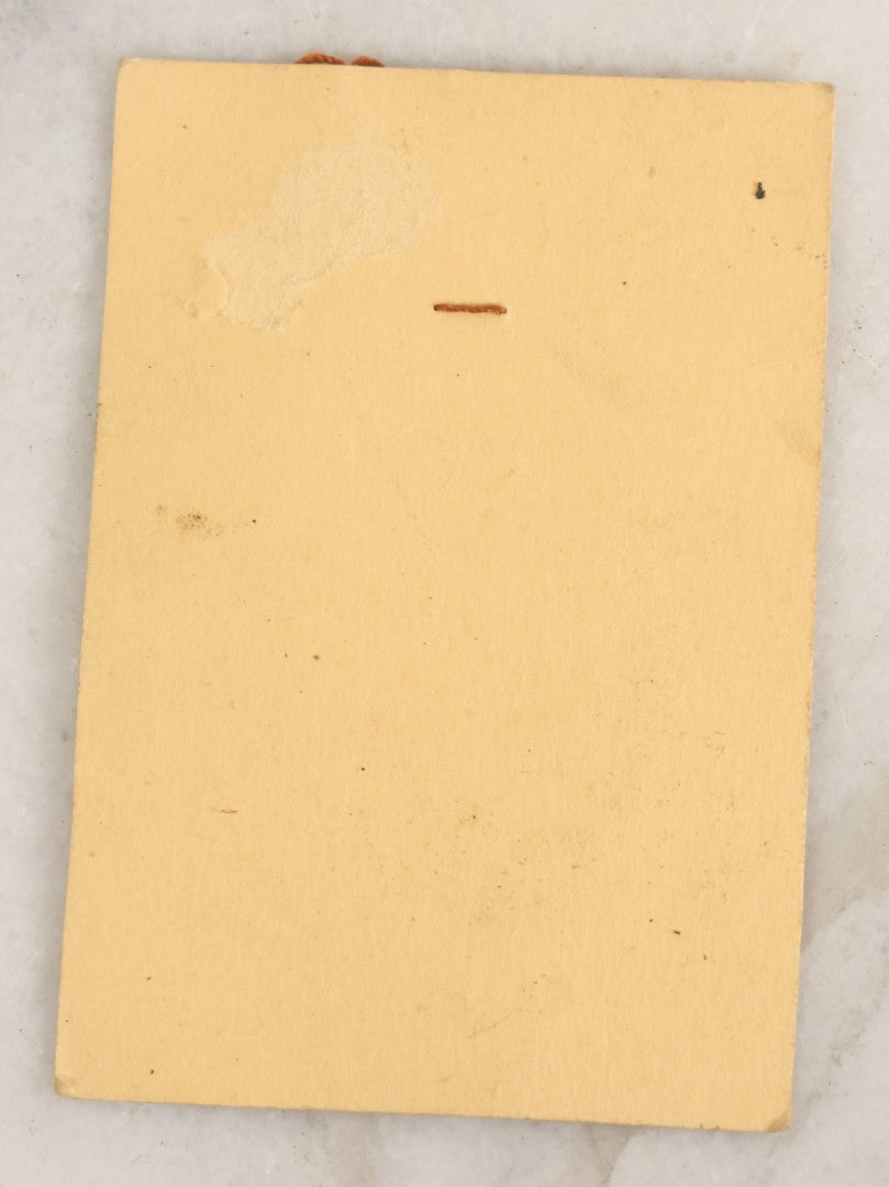 Lot 032 - Grouping Of Five Religious Devotional Smalls Including Prayer Card Of Unknown Nun With Lace Border, Four Metal Religious Charms