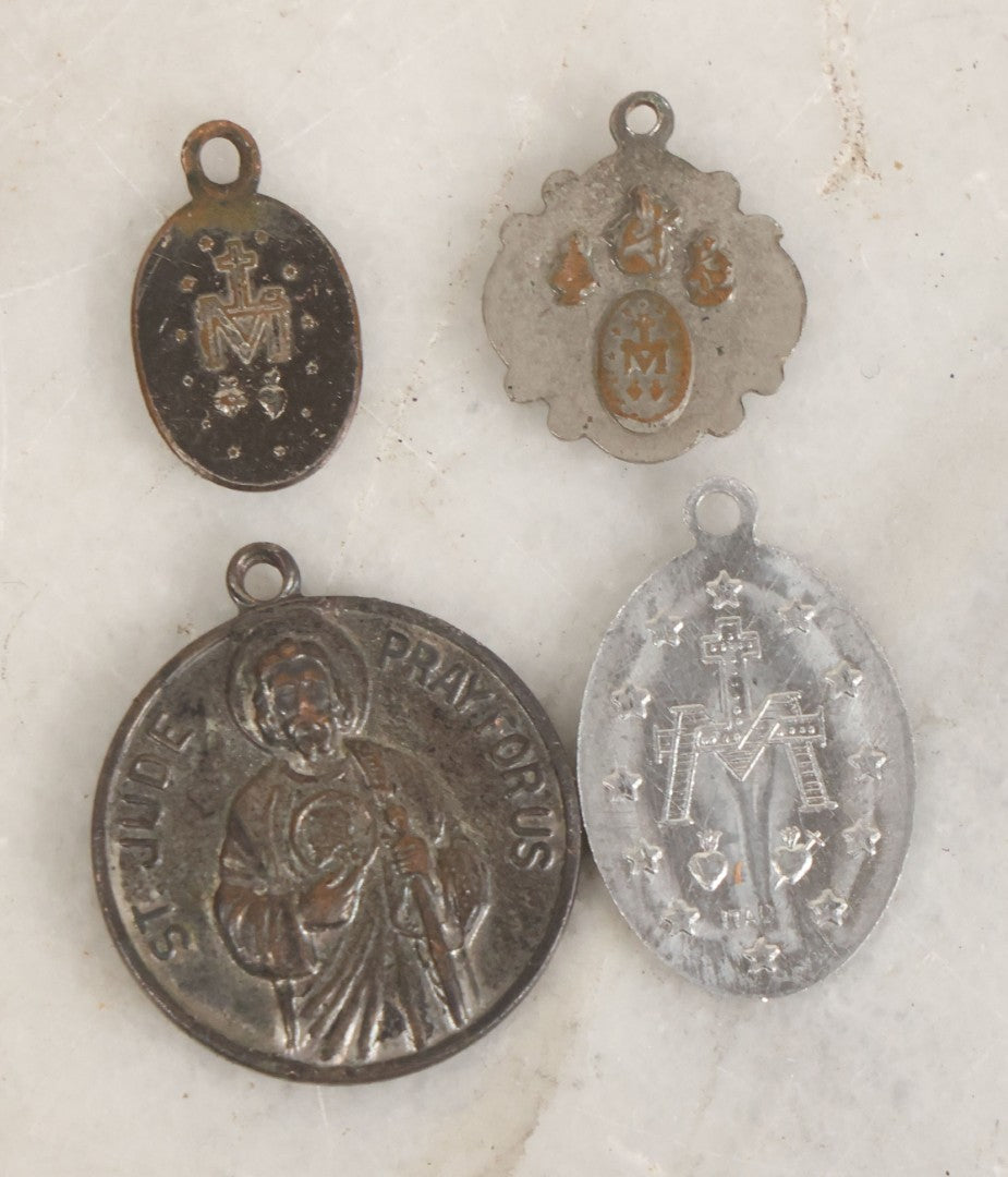 Lot 032 - Grouping Of Five Religious Devotional Smalls Including Prayer Card Of Unknown Nun With Lace Border, Four Metal Religious Charms