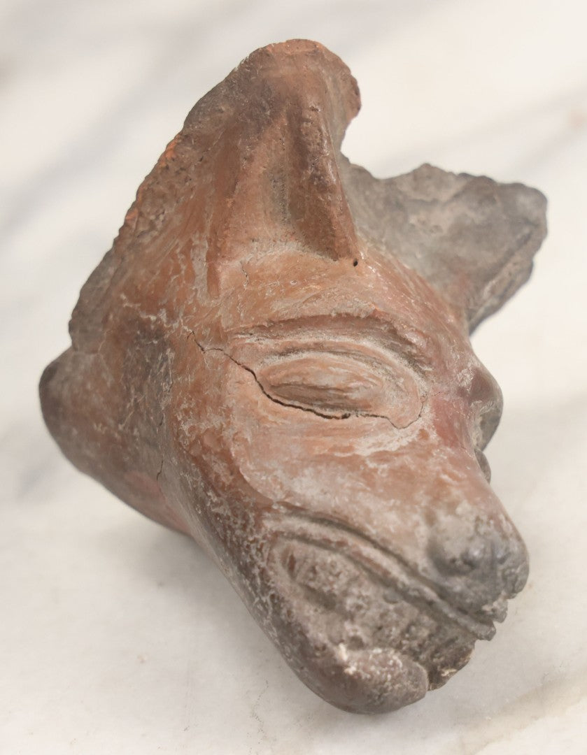 Lot 039 - Vintage Replica Pre-Columbian Style Mesoamerican Artifact, Wolf Canine Head Bearing Teeth Circa Mid-20th Century