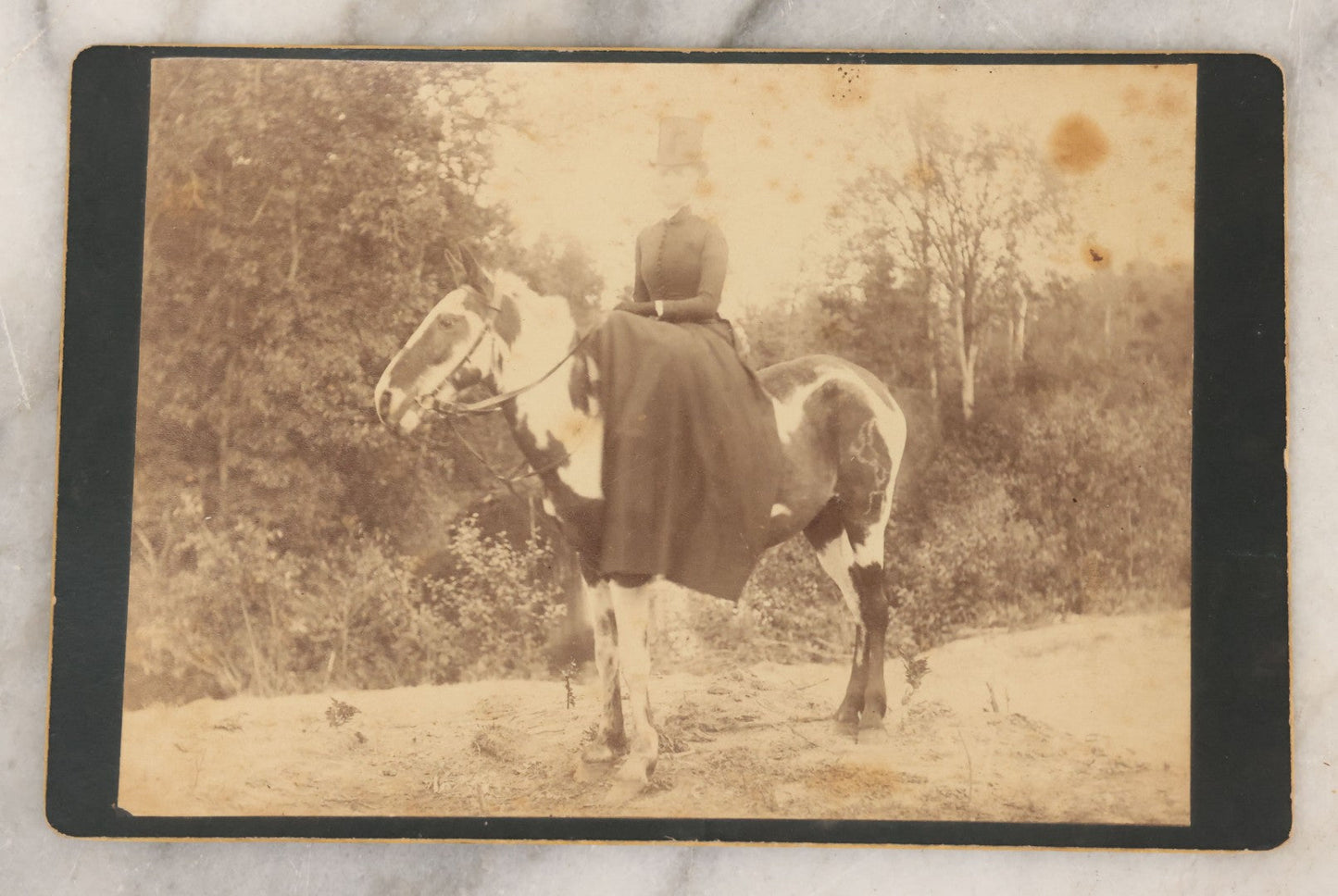 Lot 046 - Antique Cabinet Card Photograph Of A Woman In A Stovepipe Top Hat Riding A Piebald Horse, Identification And Provenance On Verso, Identified As Aunt Dottie Lyon, Wife Of Charles Lyon