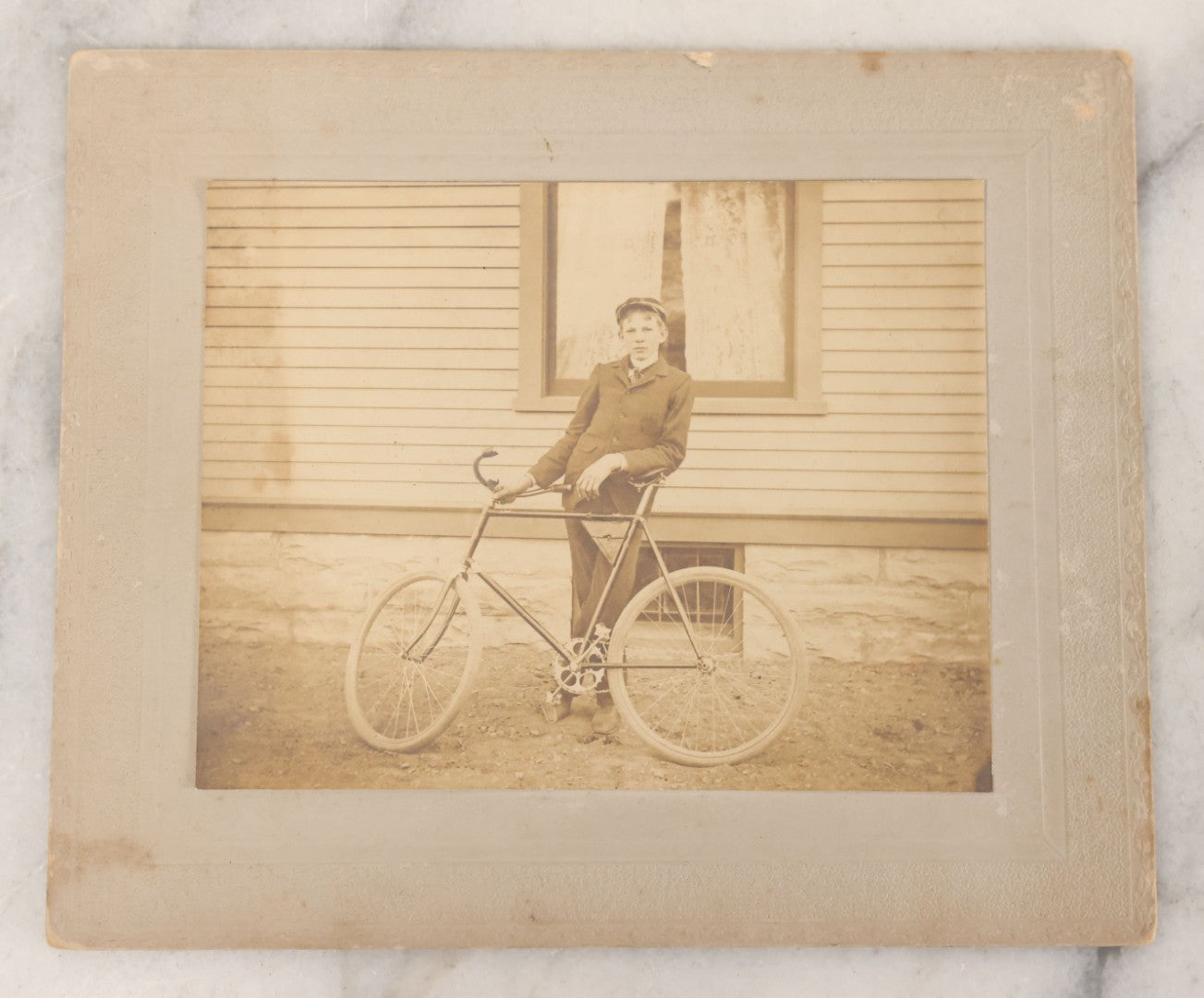 Lot 047 - Grouping Of Three Antique Boarded Photographs Of A Young Boy Identified As Oscar E. Benson Posing With His White-Wheeled Bicycle