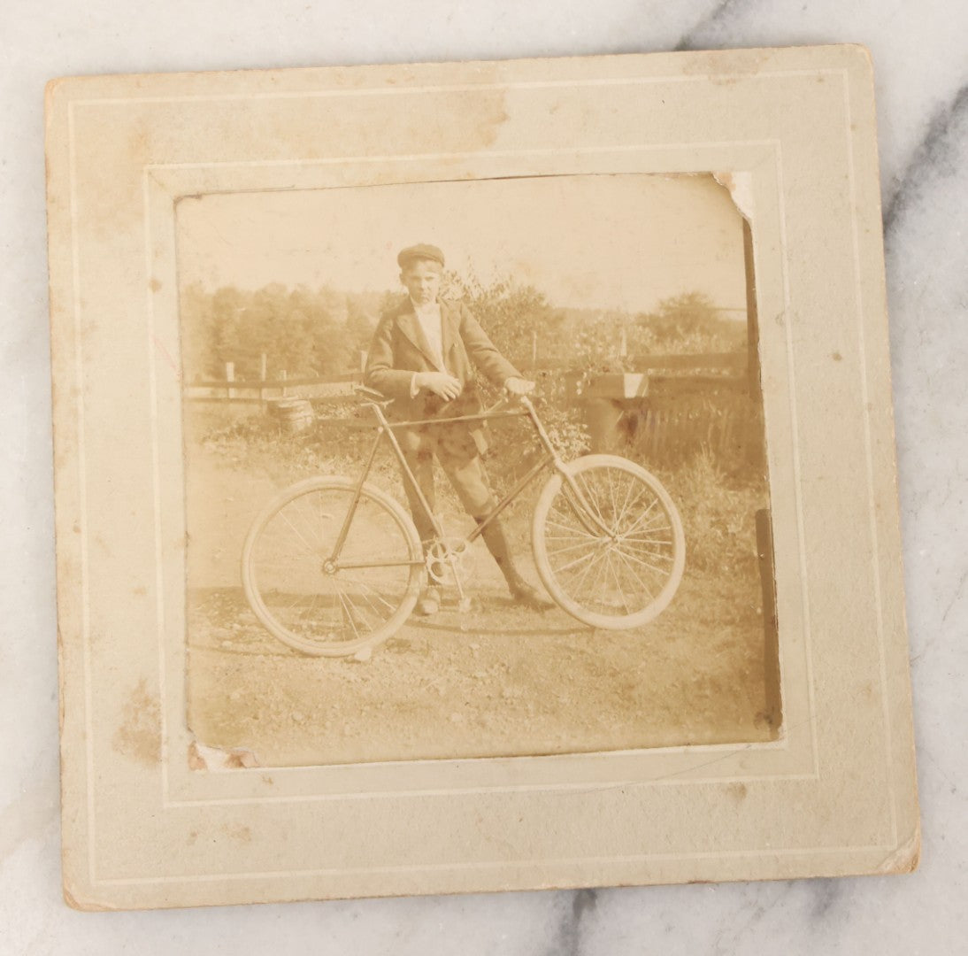 Lot 047 - Grouping Of Three Antique Boarded Photographs Of A Young Boy Identified As Oscar E. Benson Posing With His White-Wheeled Bicycle