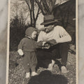 Lot 050 - Antique Unmounted Photograph Of A Father Smoking A Cigarette Showing His Young Son How To Hold A Pistol